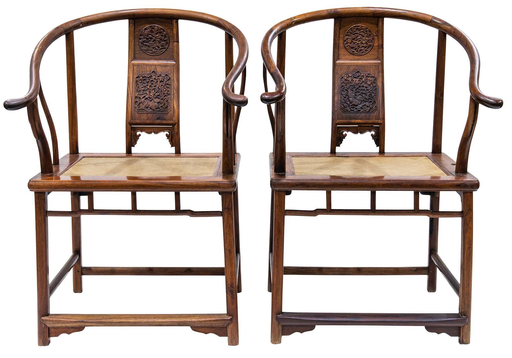 Pair of Chinese huanghuali horseshoe-back armchairs.Sold: $200,000