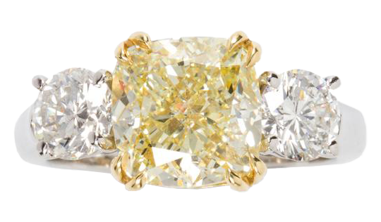 A fancy light yellow and platinum diamond ring.