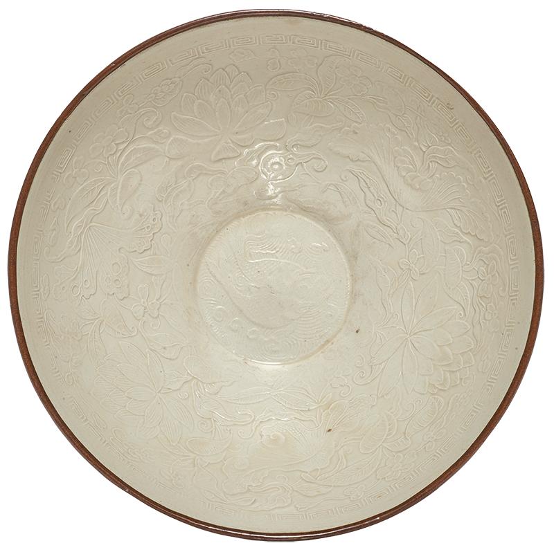 Chinese molded Dingyao bowl. Provenance: Sotheby’s Parke Bernet Los Angeles, The Late Chingwah Lee Collection, June 8, 1981, lot 263, from San Francisco collection formed over five decades.<br><b>Estimate: $50,000–$70,000.</b>
