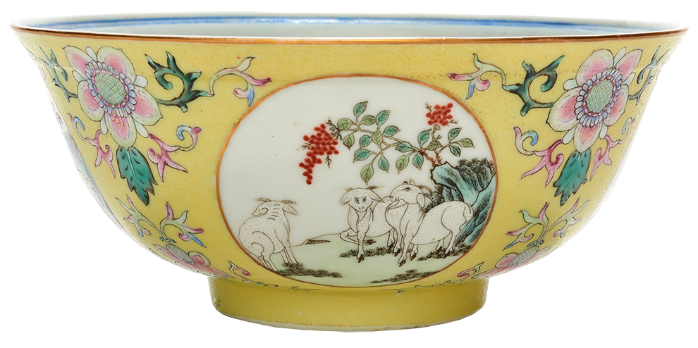 Chinese famille rose yellow ground ‘Three Rams’ bowl. Provenance: Acquired in Shanghai prior to 1945.Estimate: $5,000–$7,000.