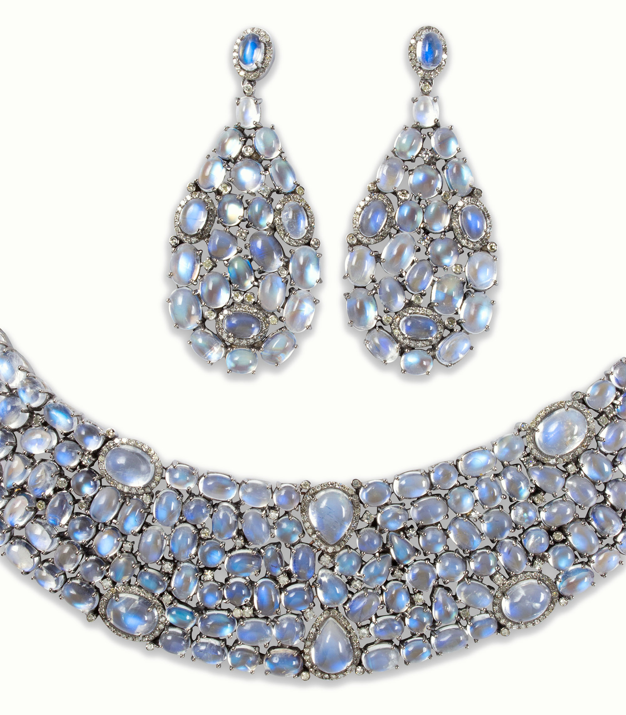 A pair of blue moonstone and diamond earrings and necklace suite