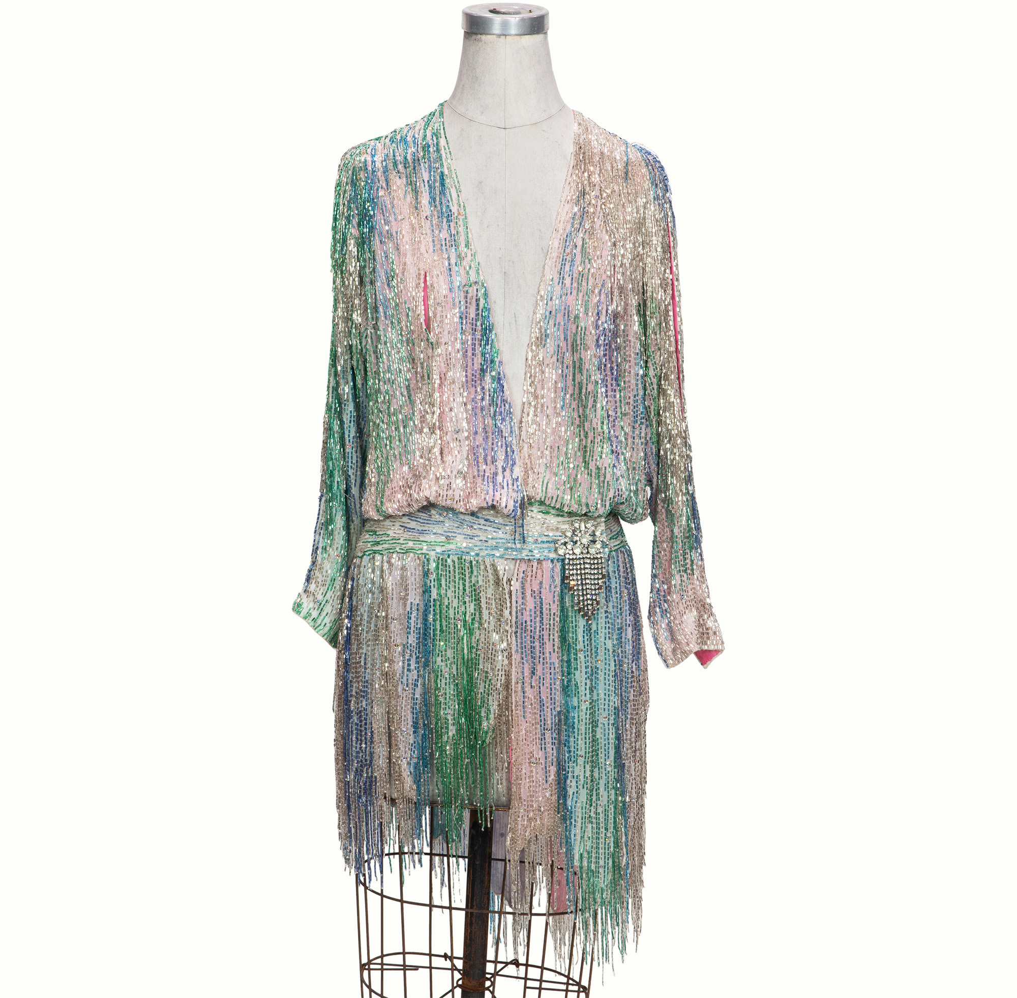 Rita Moreno, mini dress with pink and purple fringe, likely worn at the 1988 Ice Capades T.V. Special.