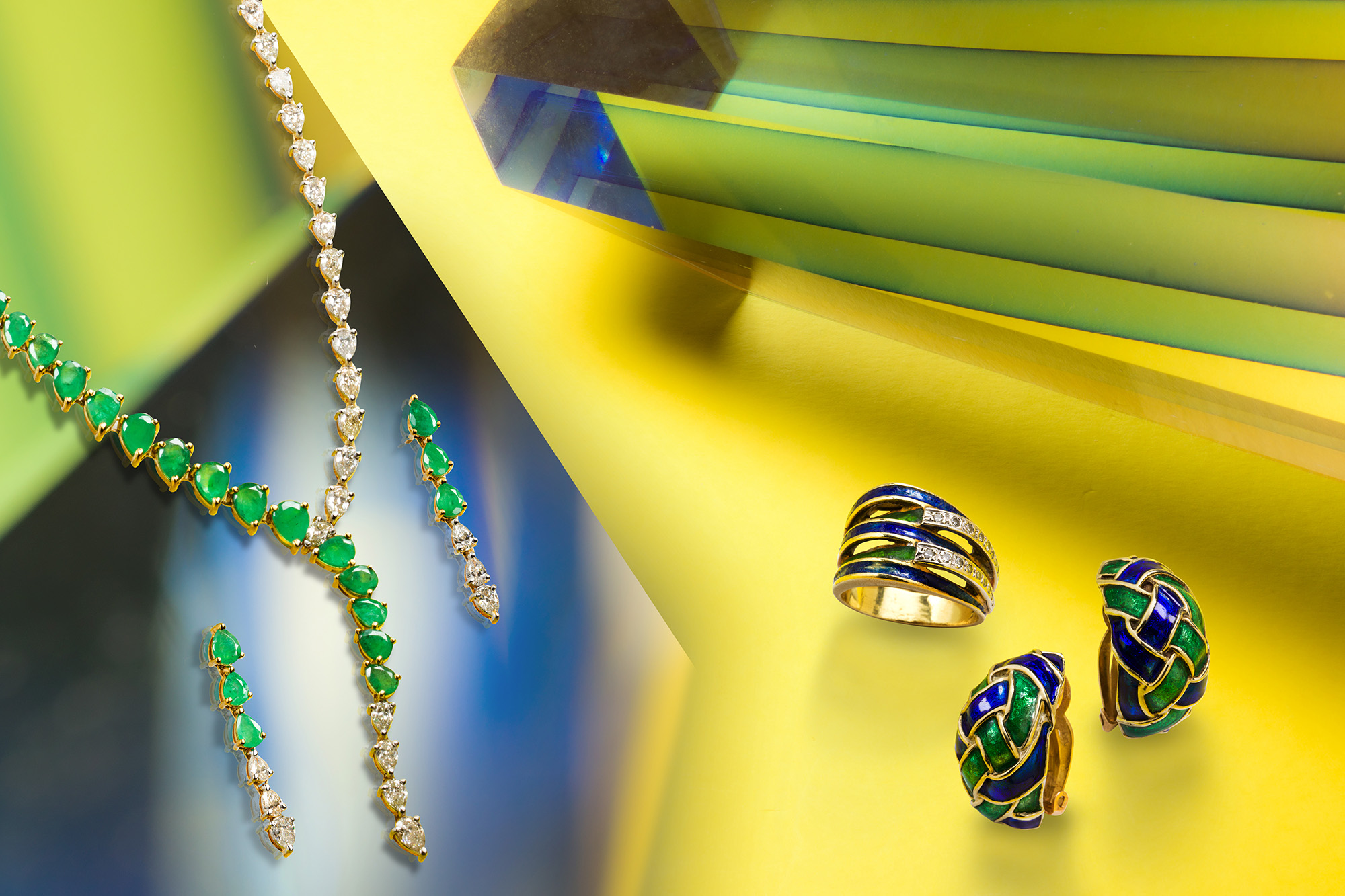 Left: An emerald, diamond and fourteen karat necklace and earrings suite. Right: A pair of enameled ear clips and ring suite.