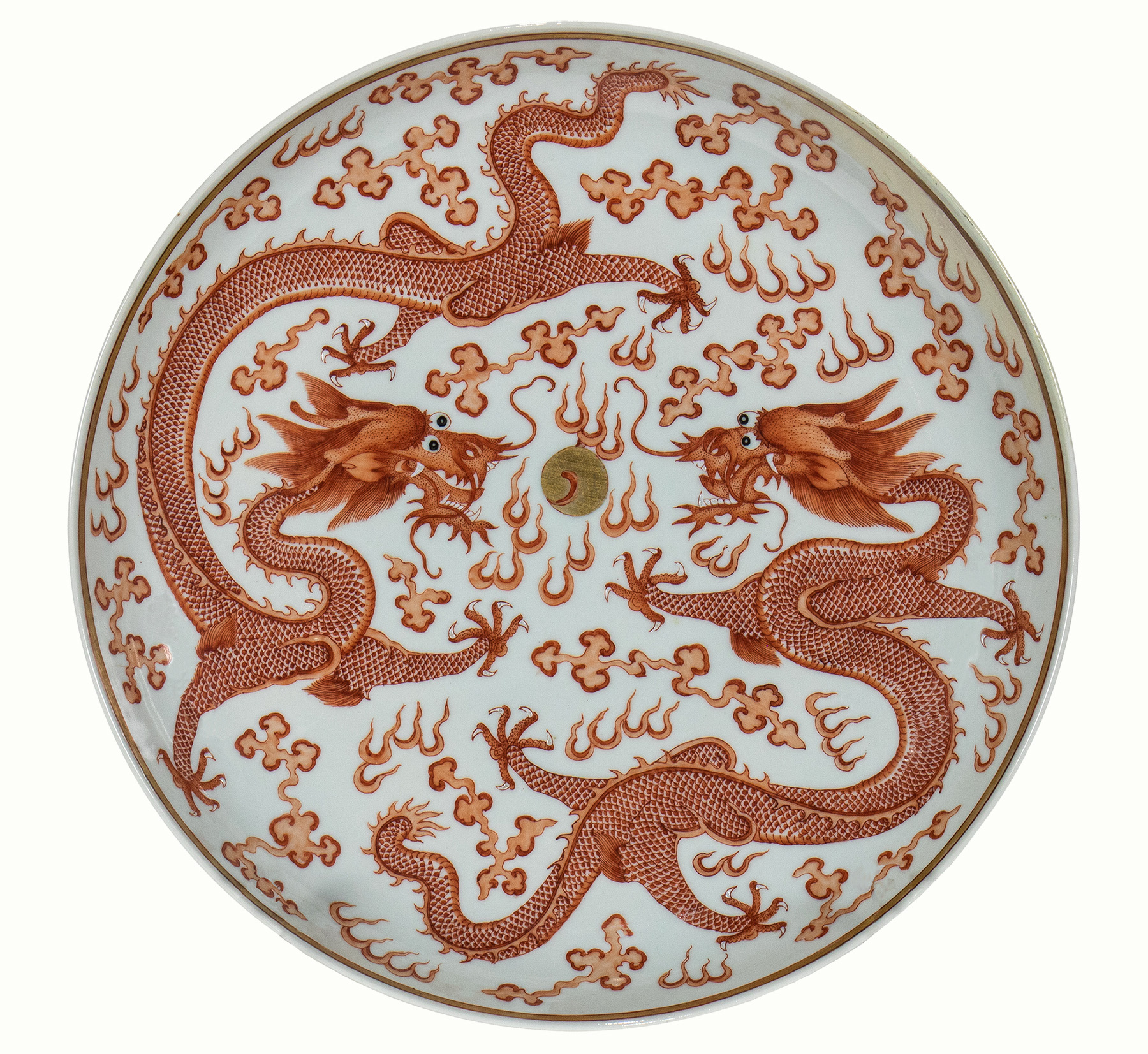 A Chinese iron-red decorated ‘dragon’ charger.
