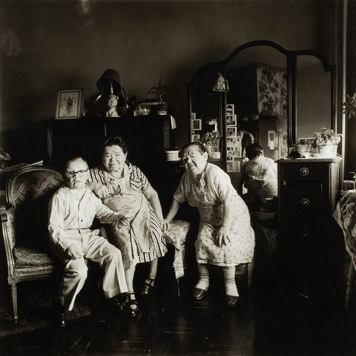 Diane Arbus, Russian Midget Friends in a Living Room on 100th Street NYC.