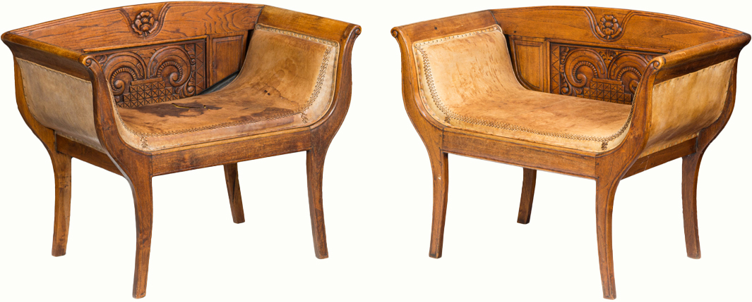 A matched pair of Italian Neoclassical style oak armchairs