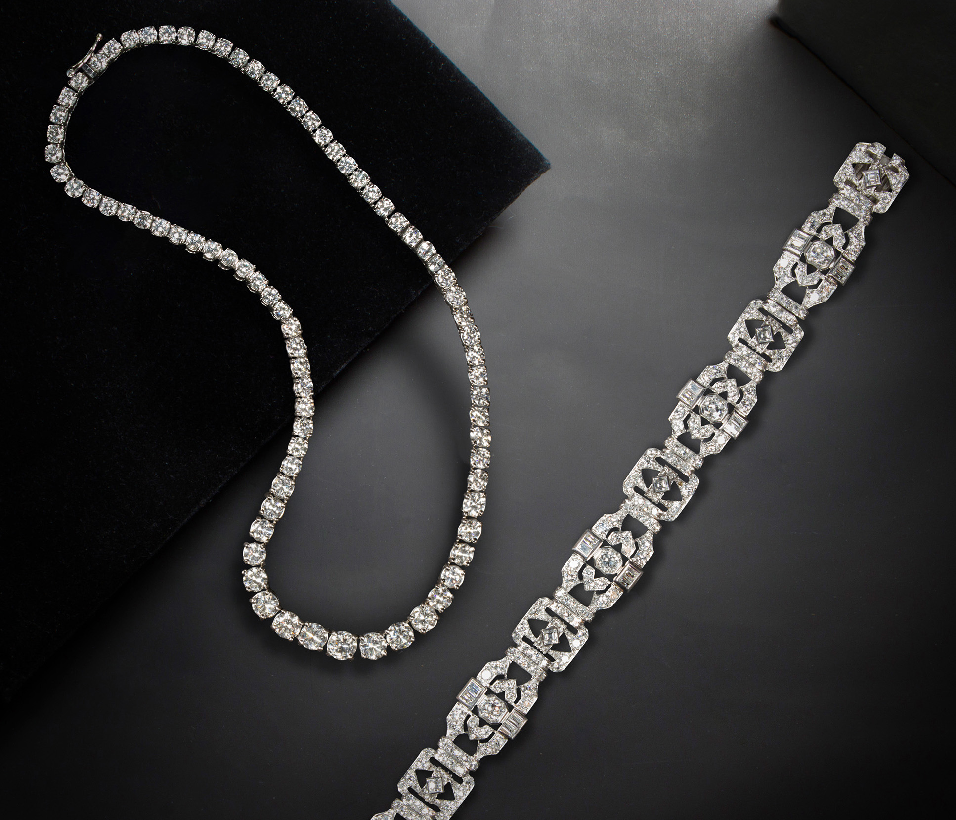Left: A diamond and platinum rivière necklace. Right: A diamond and platinum bracelet.