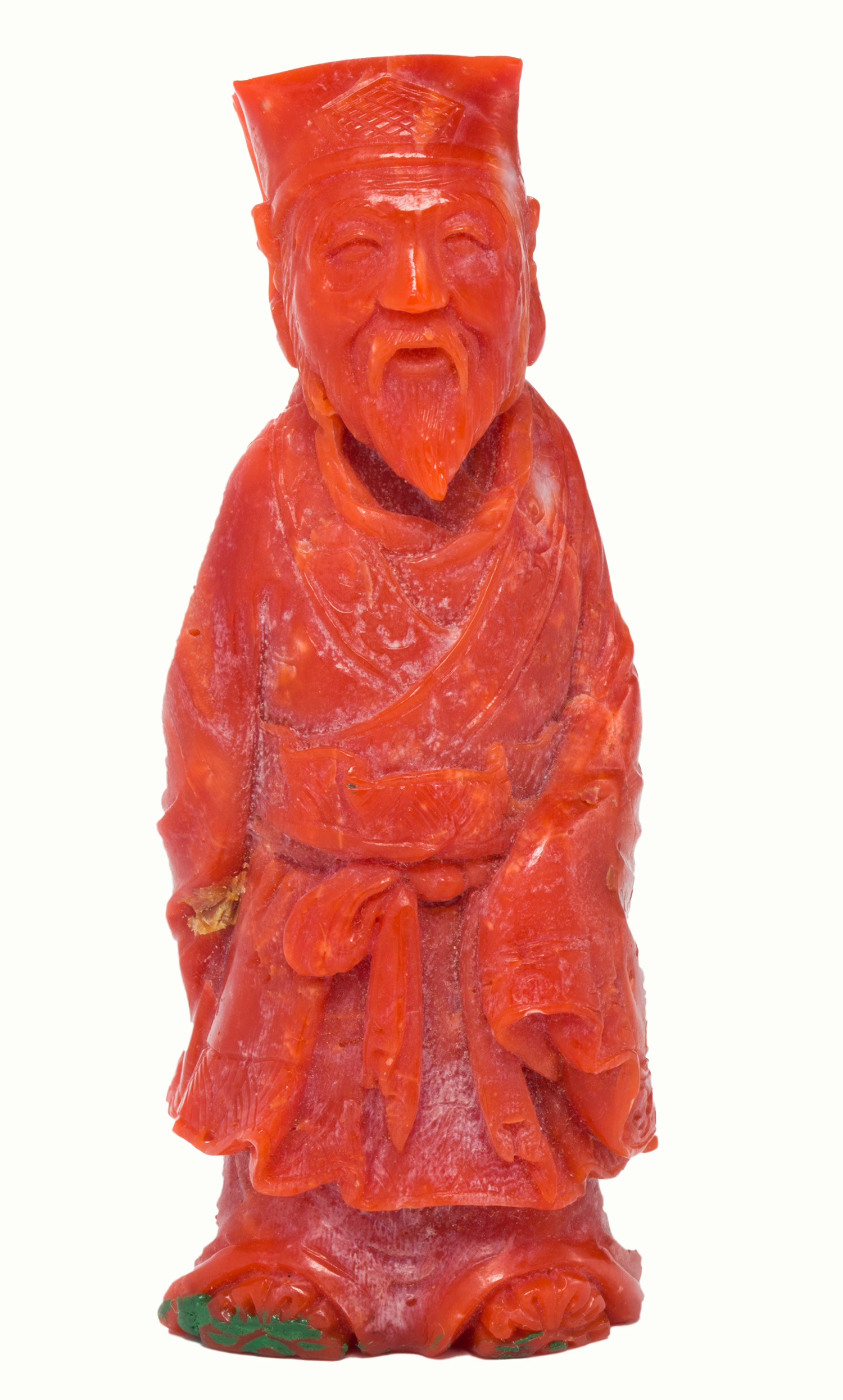A Japanese red coral carving of Jurojin.