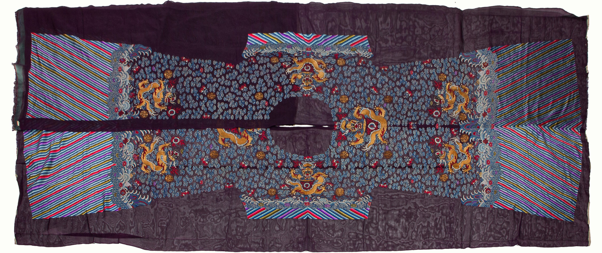 A Chinese late Qing dynasty uncut purple ground ‘dragon’ robe.