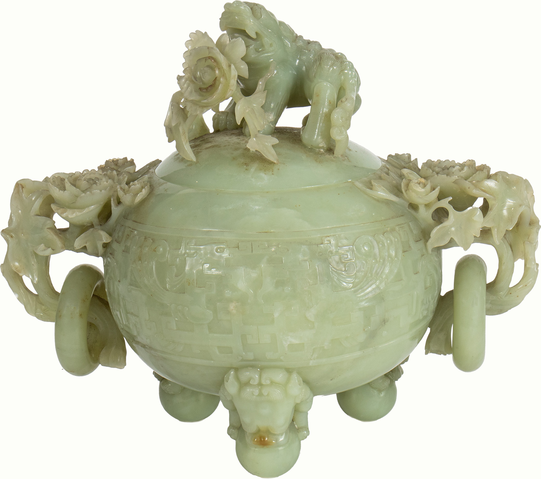 A Chinese celadon jade tripod censer and cover.