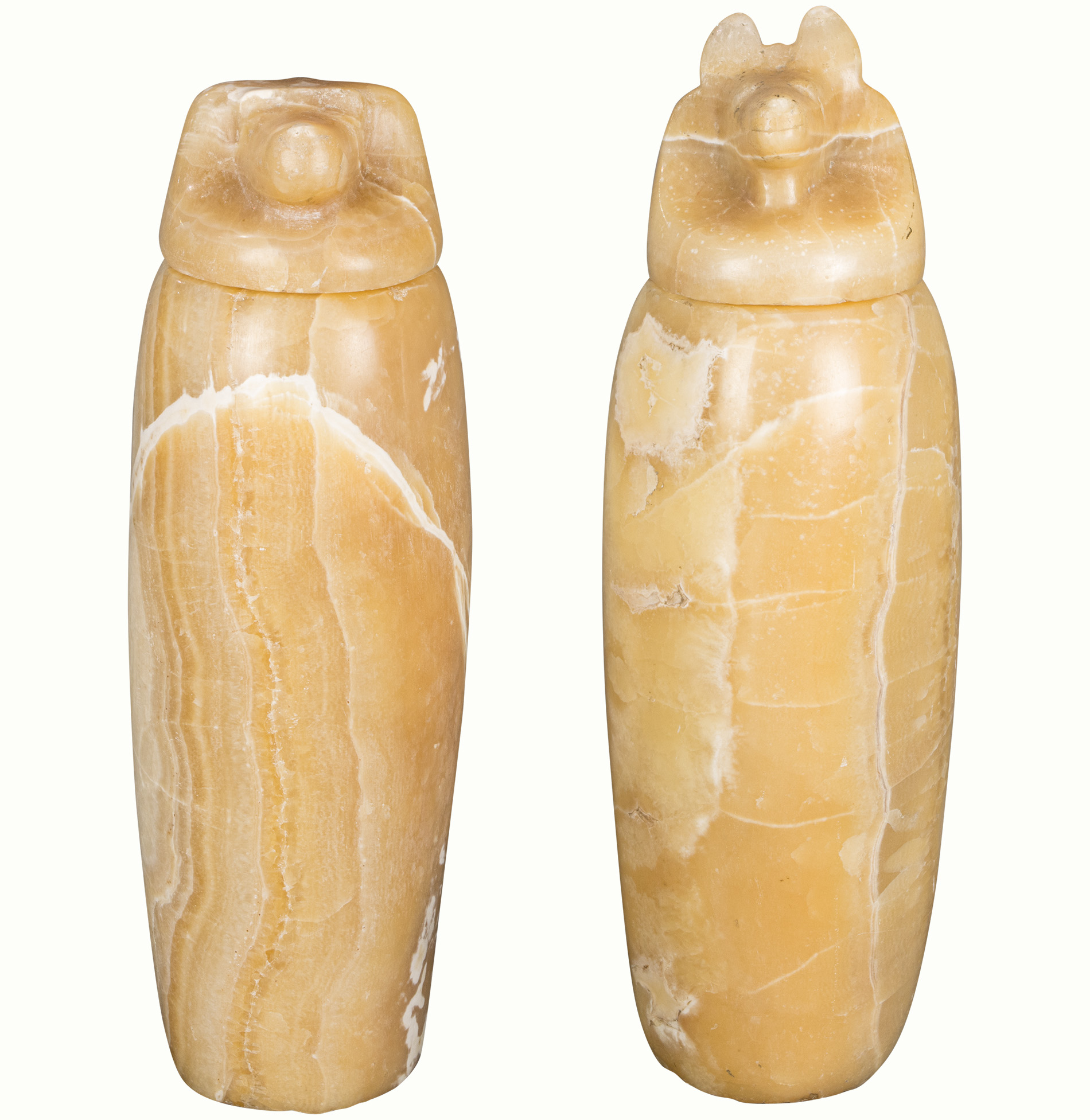 A pair of Egyptian Alabaster Canopic jars. Provenance: General Sir Maxwell of the British Army.