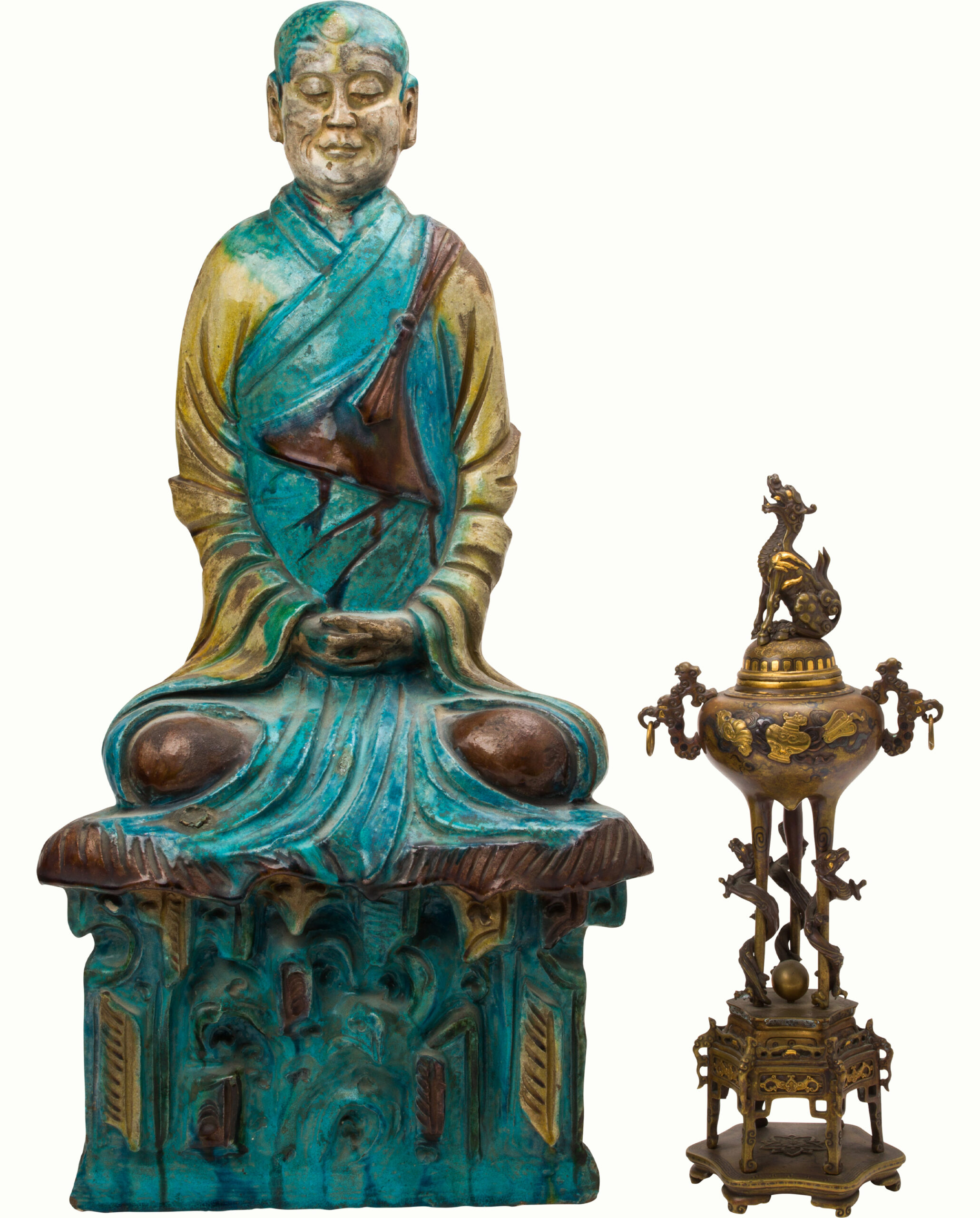 Left: A Ming Dynasty Fahua ceramic figure of a luohan. Estimate: $6,000–$8,000Right: A Japanese inlaid bronze ‘dragon’ koro and cover. Estimate: $1,500–$2,500