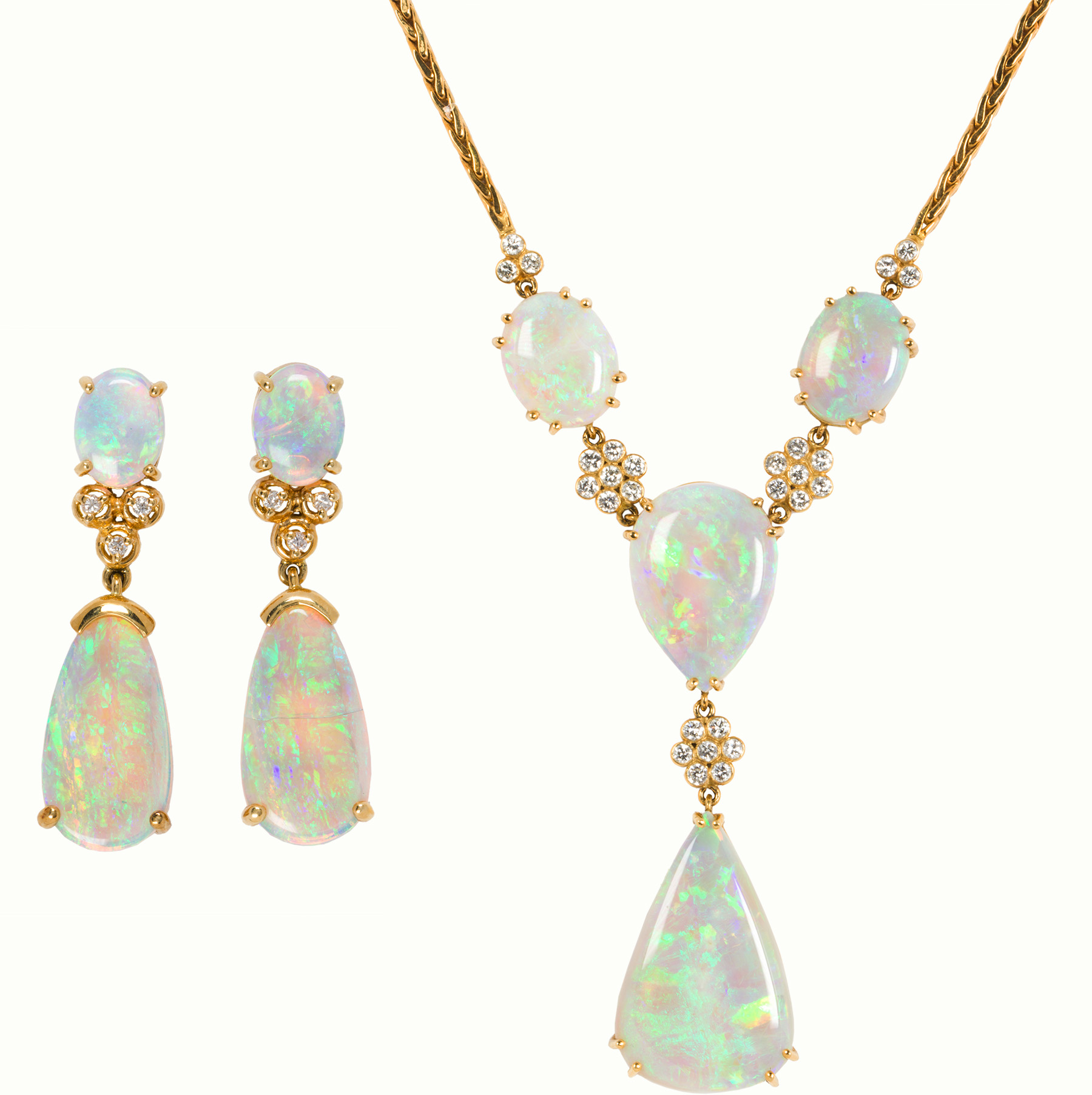 An opal, diamond and 18k gold necklace and earring set.