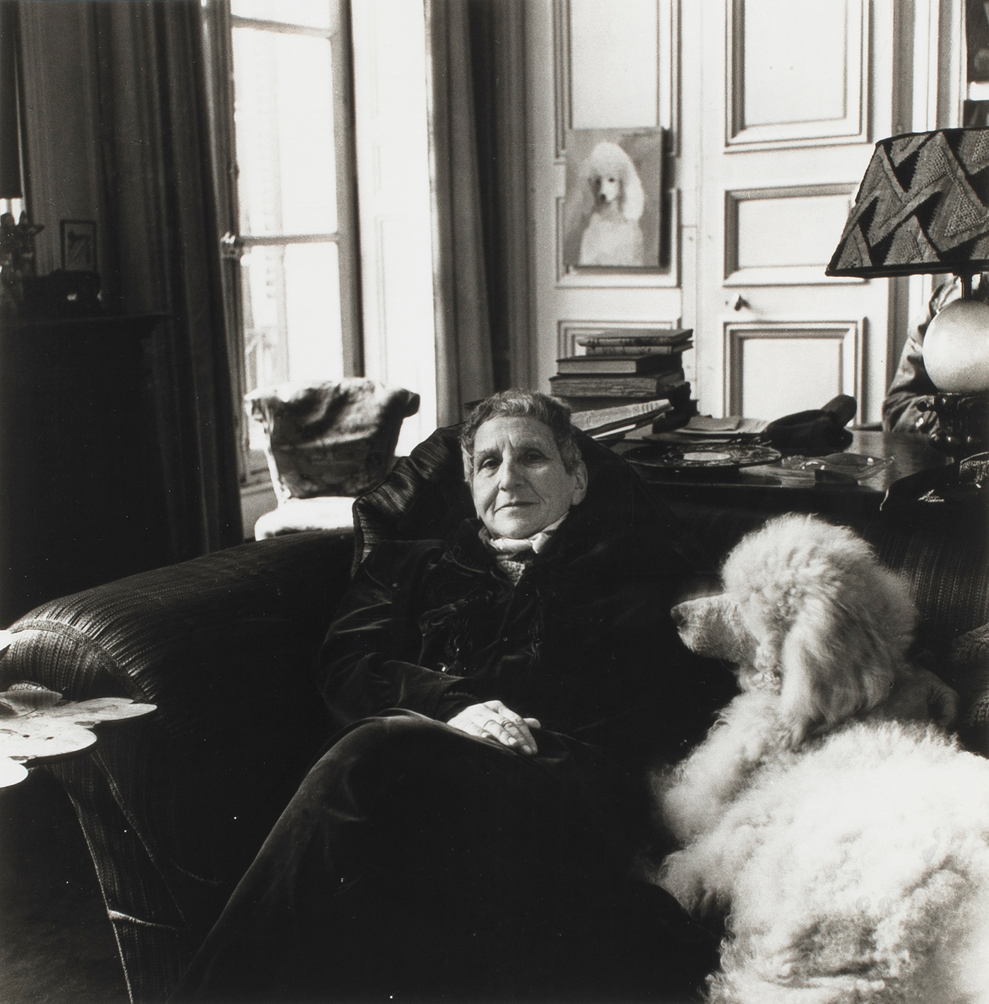 Horst P. Horst (American/German, 1906–1999), Gertrude Stein with her Poodle (1946), gelatin silver print, later printing, 7.63″ x 7.5″.
