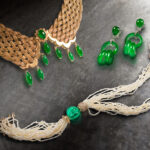 Clockwise: An &lsquo;A Grade&rsquo; jadeite and 14k gold choker necklace. Sold: $10,080; A pair of &lsquo;A Grade&rsquo; jadeite and platinum ear-clips. Sold: $88,200; A Colombian emerald, seed pearl, diamond and 18k gold necklace. Sold: $63,000