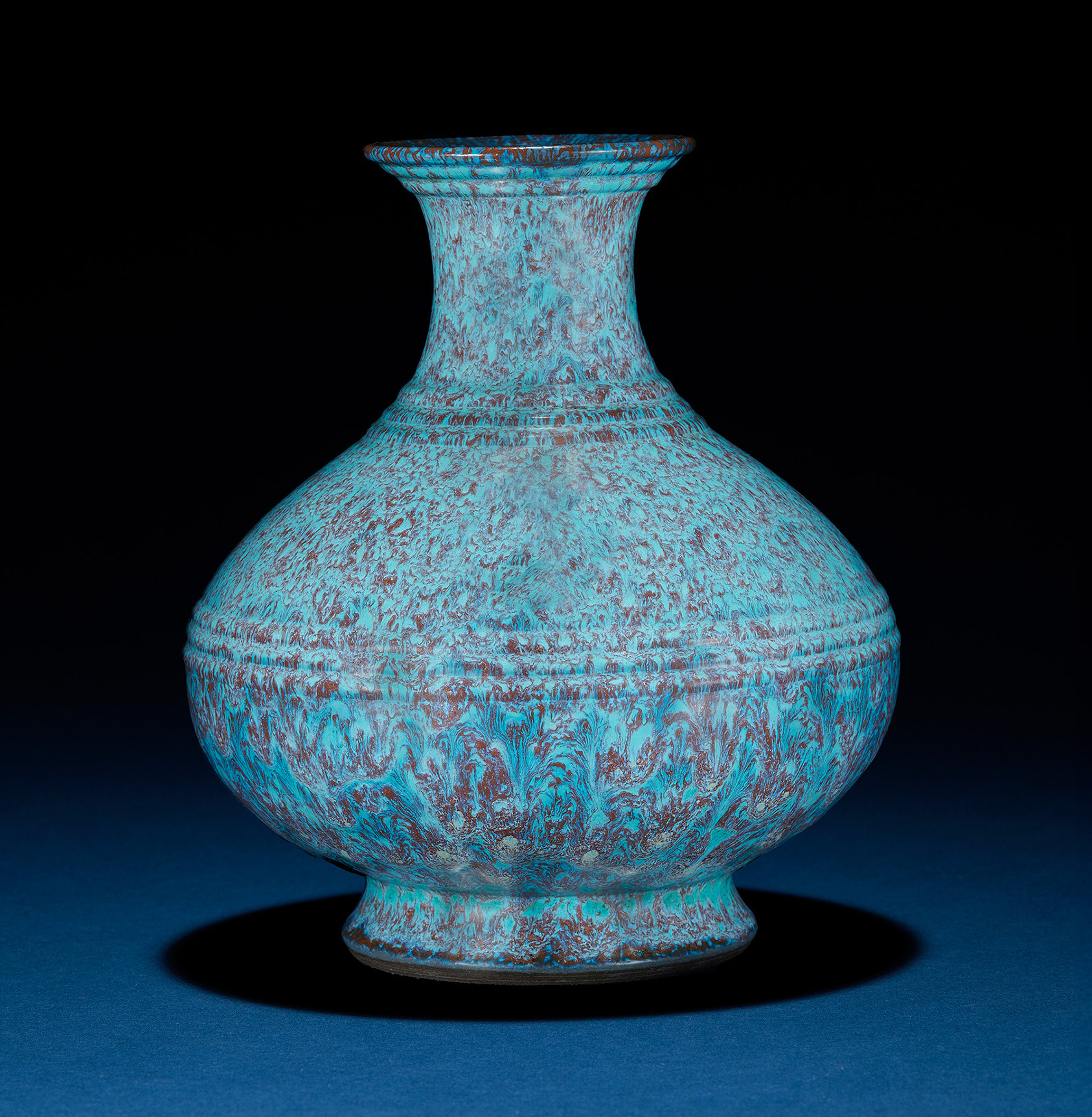 An exceptionally fine and rare robin’s egg glazed hu-form vase, seal mark and period of Yongzheng.Photo Credit: Wyatt Beserra @ BESERRA PHOTOSold: $630,000