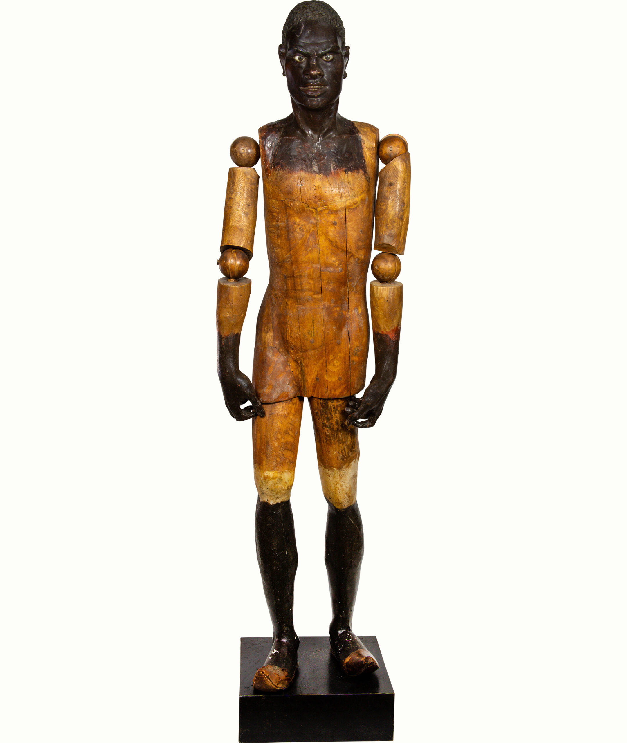 A life size Venetian Rococo carved polychrome blackamoor mannequin figure.<br><b>Estimate: $2,500–$3,500</b>