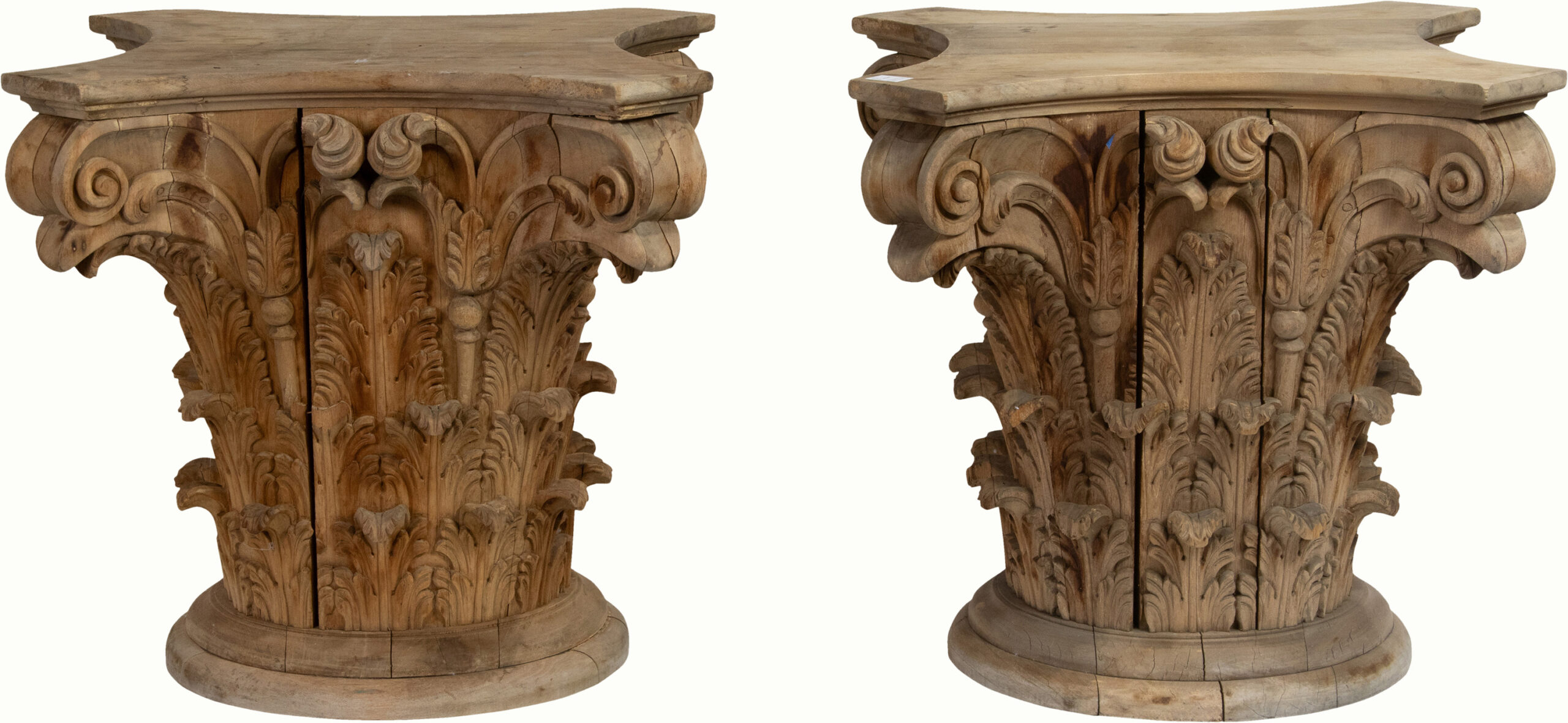 A pair of large Corinthian carved architectural capitals.<br><b>Estimate: $800–$1,200</b>