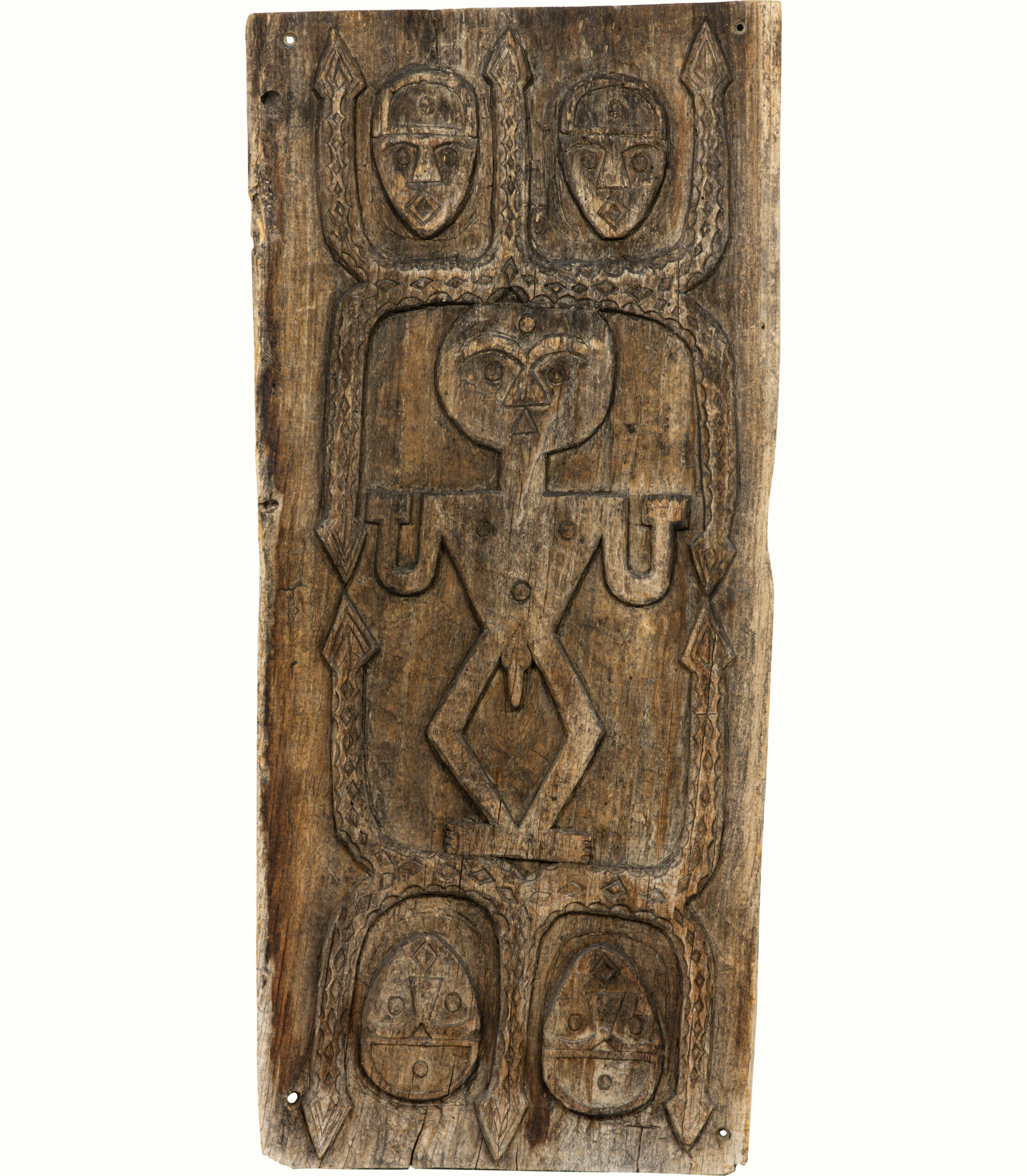 A Paiwan carved wood panel. Estimate: $1,000–$1,500