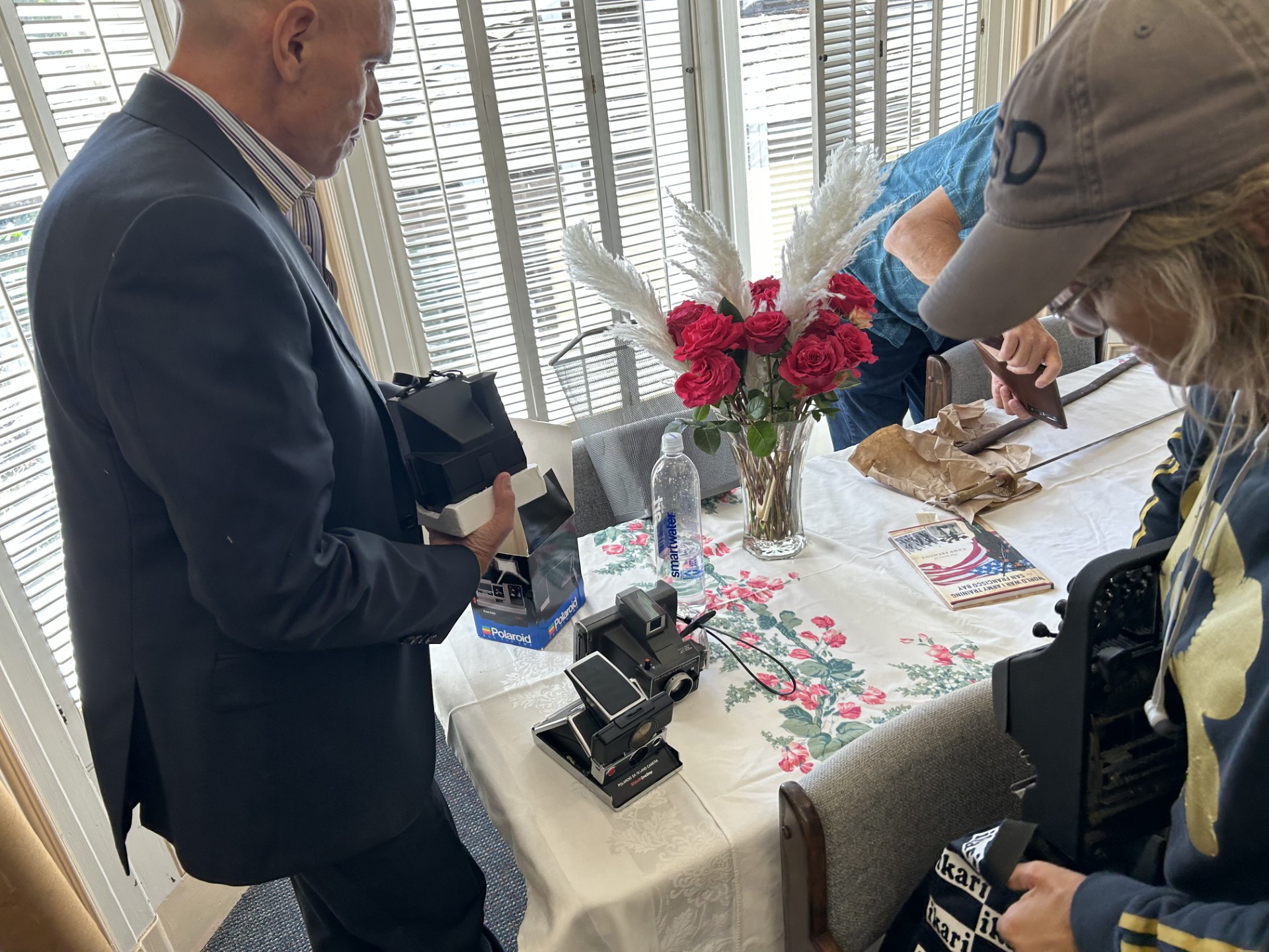 Deric providing valuation expertise to guests on their items.