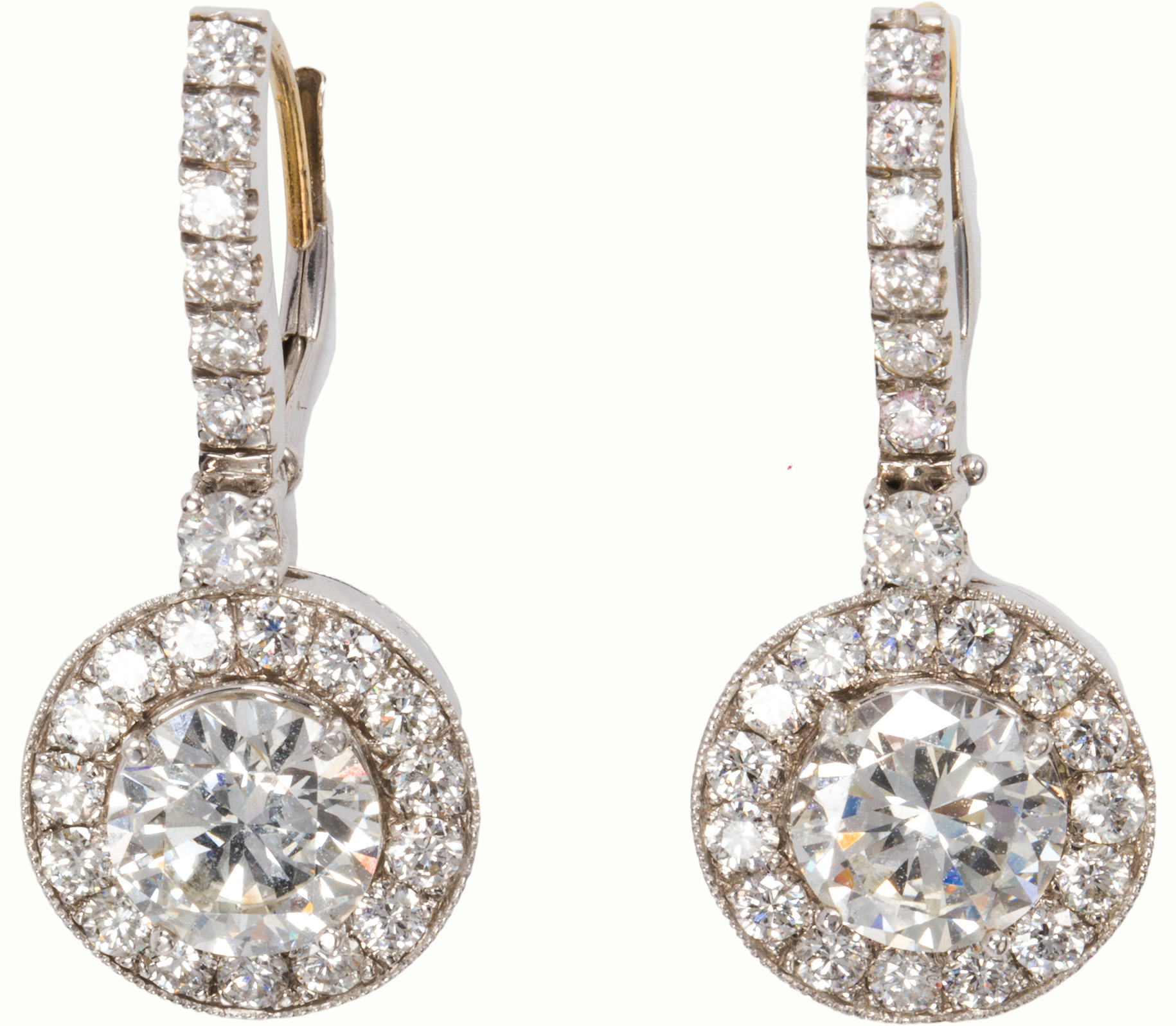 A pair of diamond and 14k white gold earrings. Estimate: $8,000–$12,000