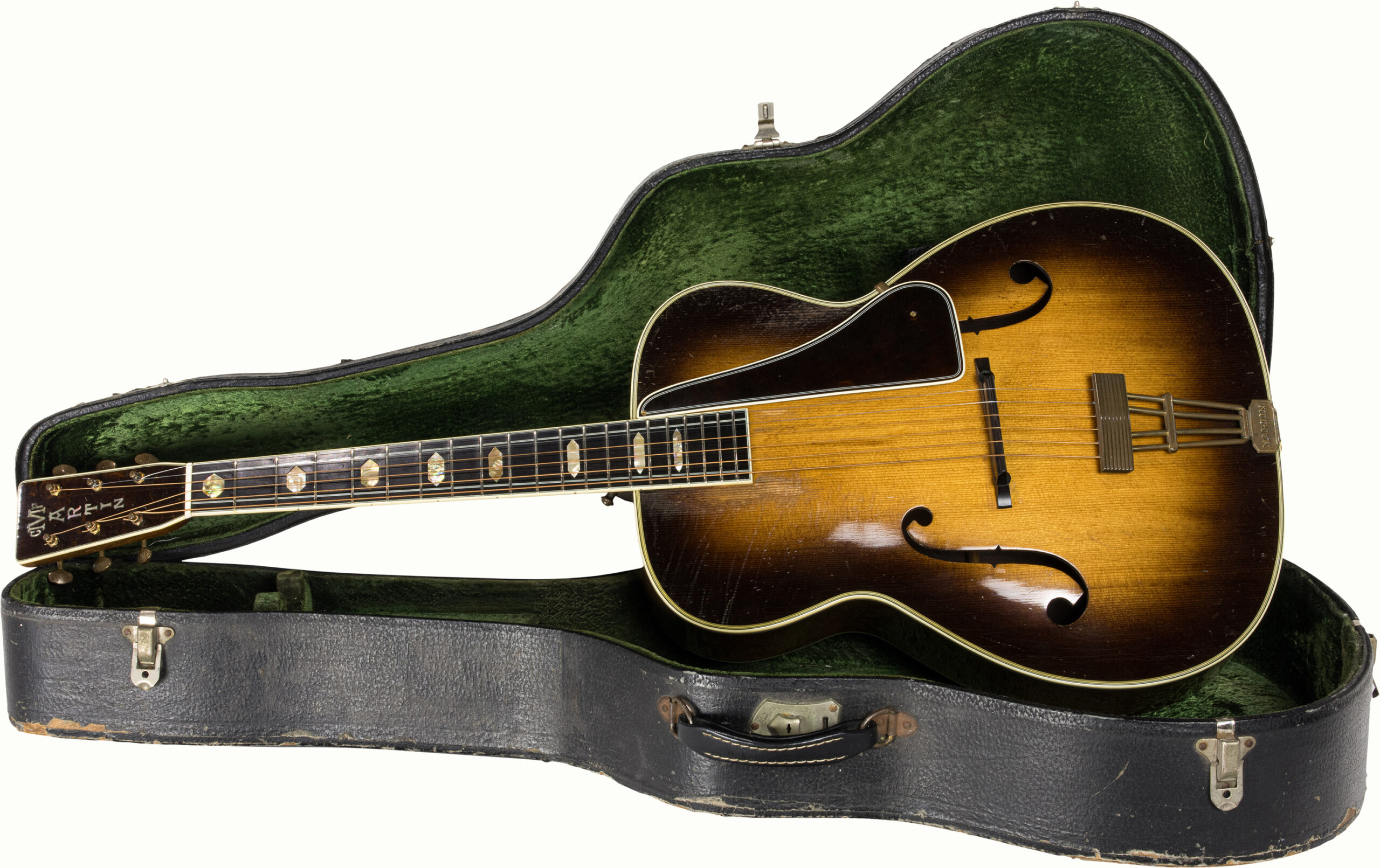 A C.F Martin 1938 F-9 Guitar, in a 1941 hard case. Please note this guitar was offered at Guernseys as lot 47 in their April 2014 auction.<br><b>Estimate: $5,000–$7,000</b><br><em>This property is being sold at public auction as provided by Internal Revenue Code section 6335. Only the right, title, and interest of the Hank Risan is being offered for sale. Property is sold “as is, where is” without recourse against the United States. The United States offers no Guarantee or warranty, implied or expressed on the condition of any property or its fitness for any purpose or use.</em>
