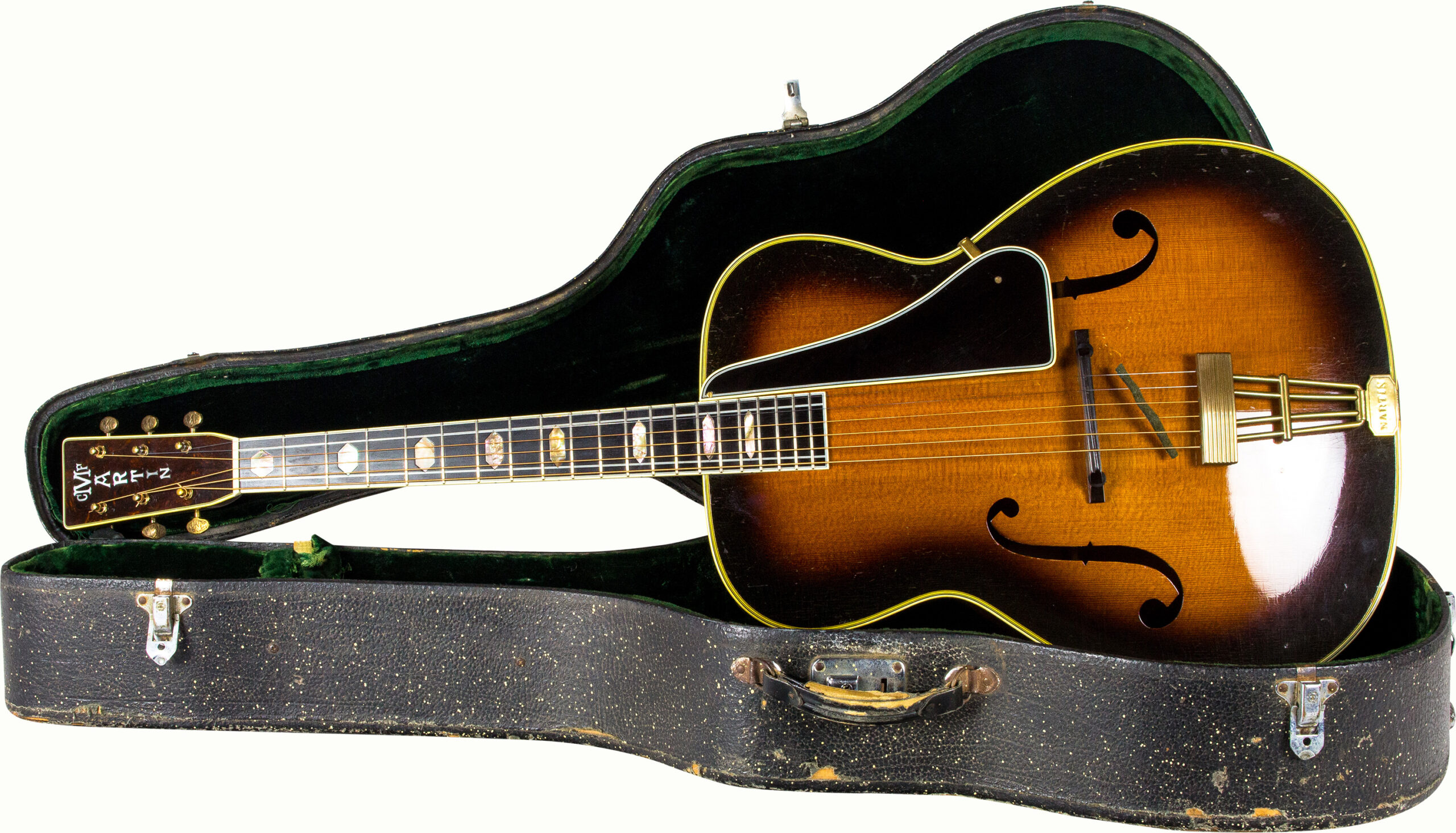 A Martin 1938 F-9 Guitar, Serial Number 63594, with hard case.<br><b>Estimate: $5,000–$7,000</b><br><em>This property is being sold at public auction as provided by Internal Revenue Code section 6335. Only the right, title, and interest of the Hank Risan is being offered for sale. Property is sold “as is, where is” without recourse against the United States. The United States offers no Guarantee or warranty, implied or expressed on the condition of any property or its fitness for any purpose or use.</em>