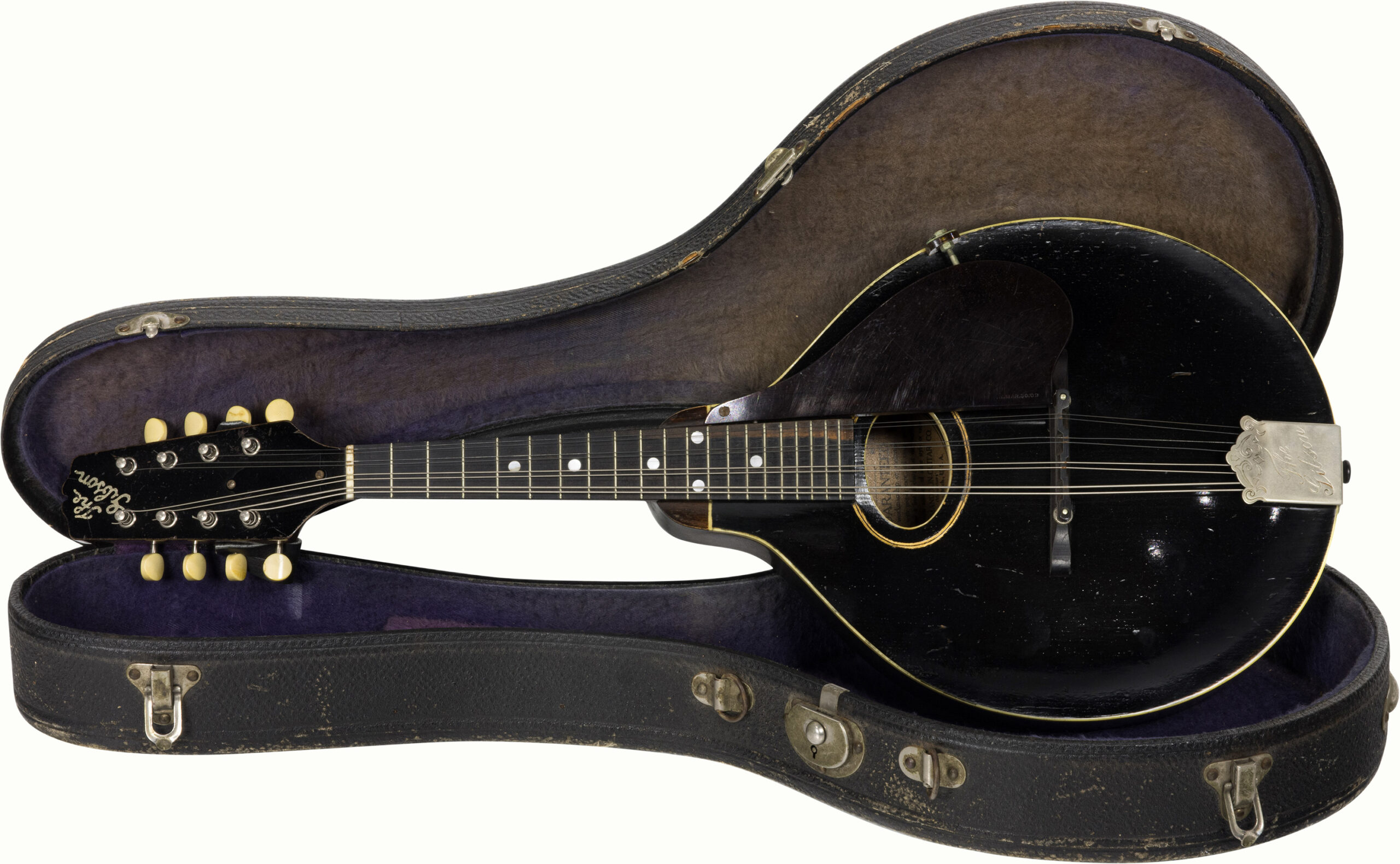 A 1924 Gibson Godfather mandolin, serial number 79987. Presumably used at Paramount Pictures in the 1973 major motion picture <em>The Godfather</em> theme and solo. Comes with a signed letter by Al Viola stating as such on Viola letterhead.<br><b>Estimate: $1,000–$1,200</b><br><em>This property is being sold at public auction as provided by Internal Revenue Code section 6335. Only the right, title, and interest of the Hank Risan is being offered for sale. Property is sold “as is, where is” without recourse against the United States. The United States offers no Guarantee or warranty, implied or expressed on the condition of any property or its fitness for any purpose or use.</em>