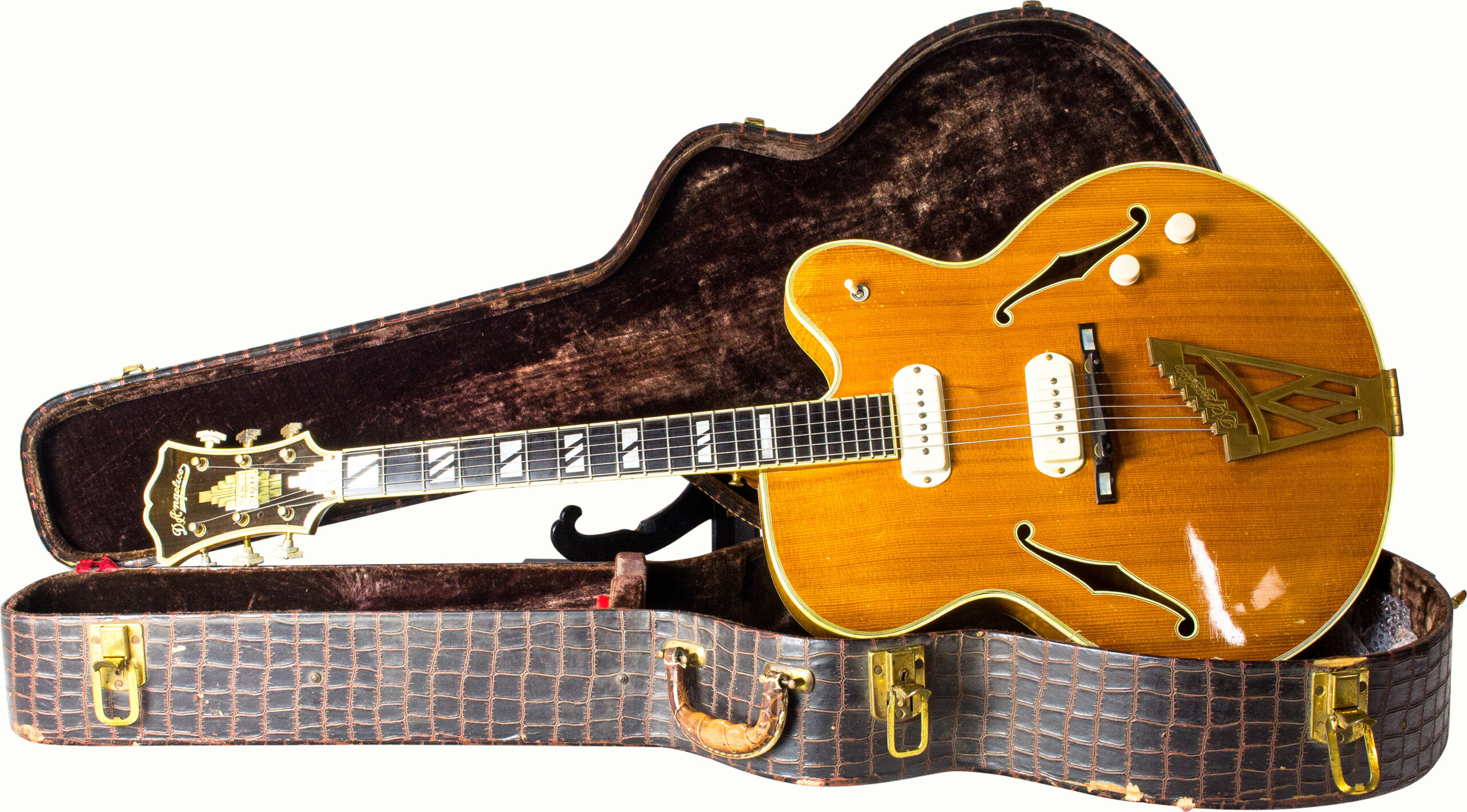 A D’Angelico New York “New Yorker” electric acoustic guitar, serial number 2211, with hard case.<br><b>Estimate: $5,000–$7,000</b><br><em>This property is being sold at public auction as provided by Internal Revenue Code section 6335. Only the right, title, and interest of the Hank Risan is being offered for sale. Property is sold “as is, where is” without recourse against the United States. The United States offers no Guarantee or warranty, implied or expressed on the condition of any property or its fitness for any purpose or use.</em>