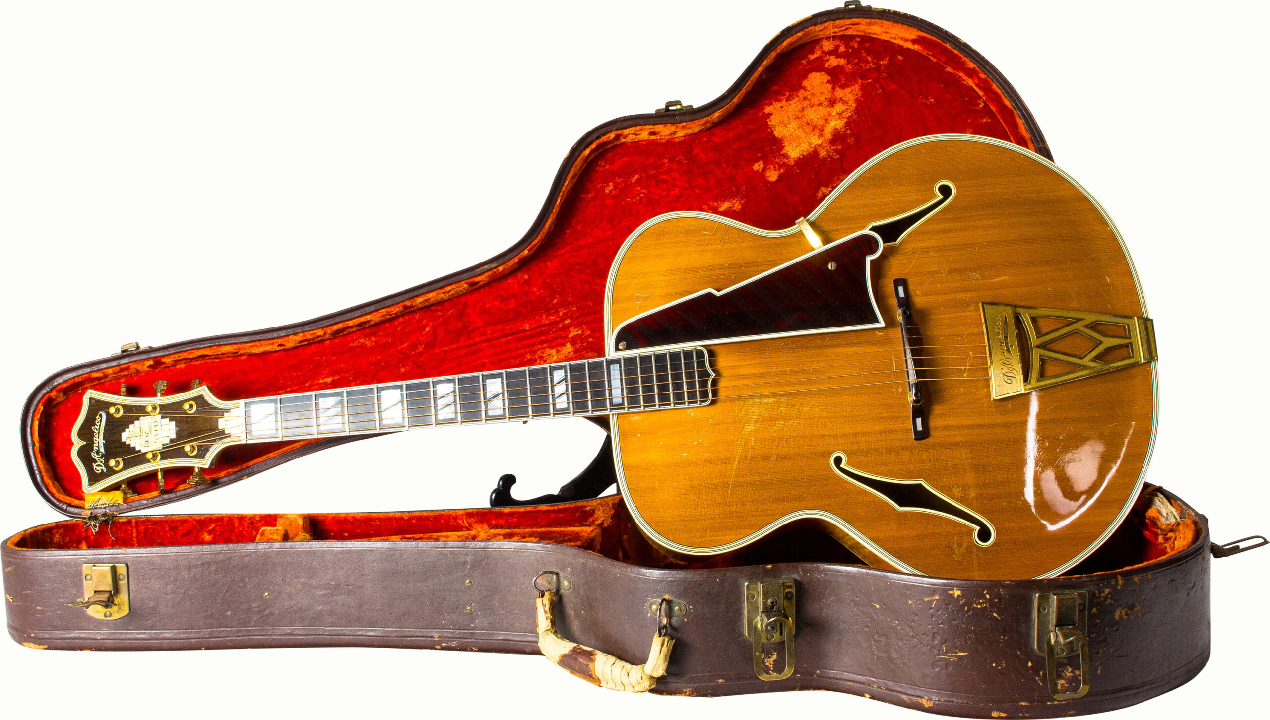 A D’Angelico New York “New Yorker” acoustic guitar, serial number 1394, with hard case.<br><b>Estimate: $7,000–$9,000</b><br><em>This property is being sold at public auction as provided by Internal Revenue Code section 6335. Only the right, title, and interest of the Hank Risan is being offered for sale. Property is sold “as is, where is” without recourse against the United States. The United States offers no Guarantee or warranty, implied or expressed on the condition of any property or its fitness for any purpose or use.</em>