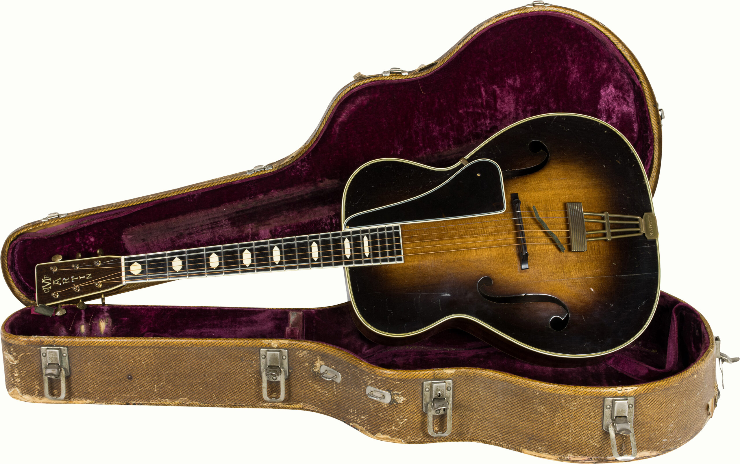 A 1935 Martin F-9 Guitar, with hard case. Please note this guitar was possibly offered at the Guernseys auction in April 2014 as Lot 47.<br><b>Estimate: $7,000–$9,000</b><br><em>This property is being sold at public auction as provided by Internal Revenue Code section 6335. Only the right, title, and interest of the Hank Risan is being offered for sale. Property is sold “as is, where is” without recourse against the United States. The United States offers no Guarantee or warranty, implied or expressed on the condition of any property or its fitness for any purpose or use.</em>
