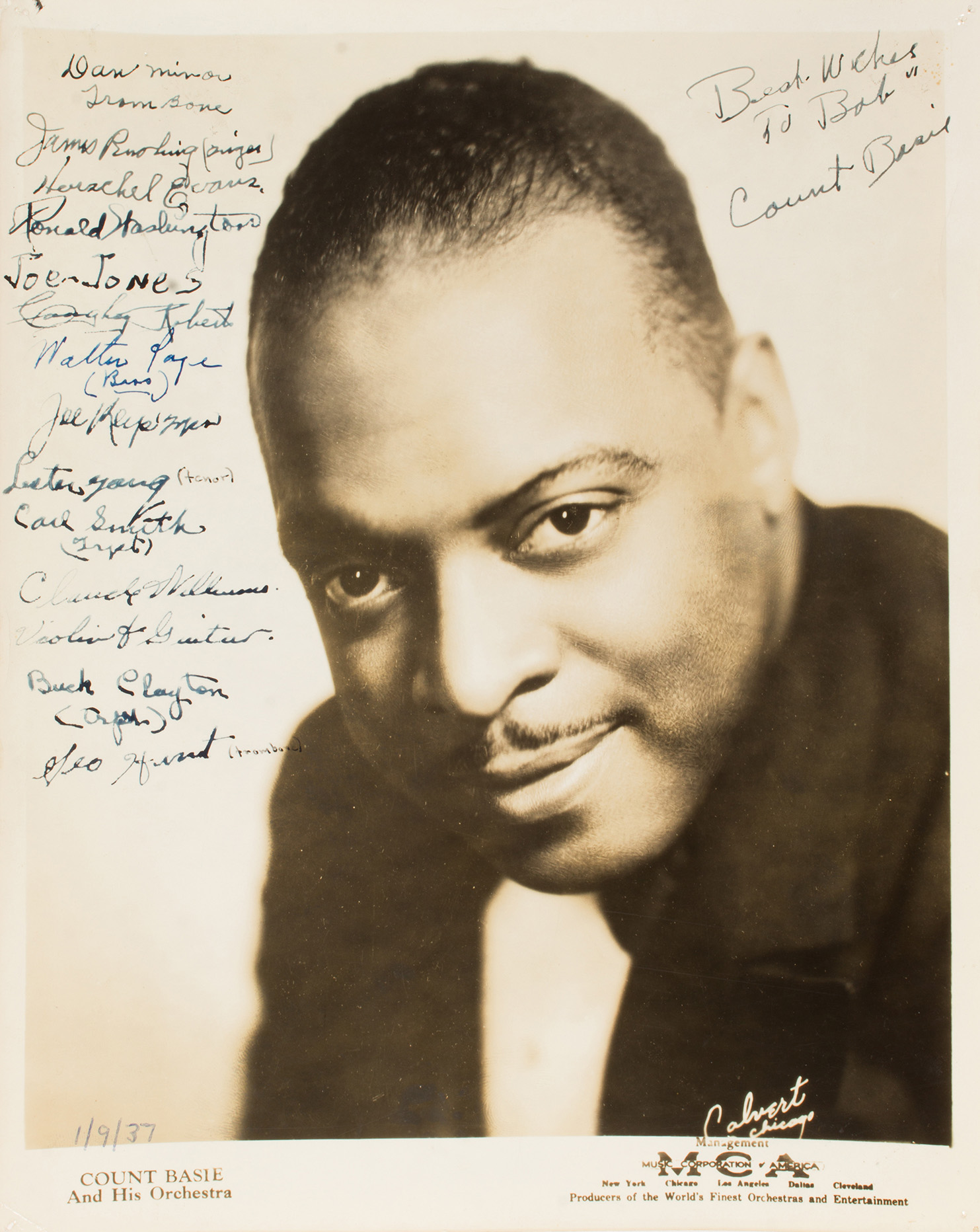 Two signed Count Basie MCA jazz press photos in binder, each include numerous signatures including Billie Holiday. Sold: $3,200