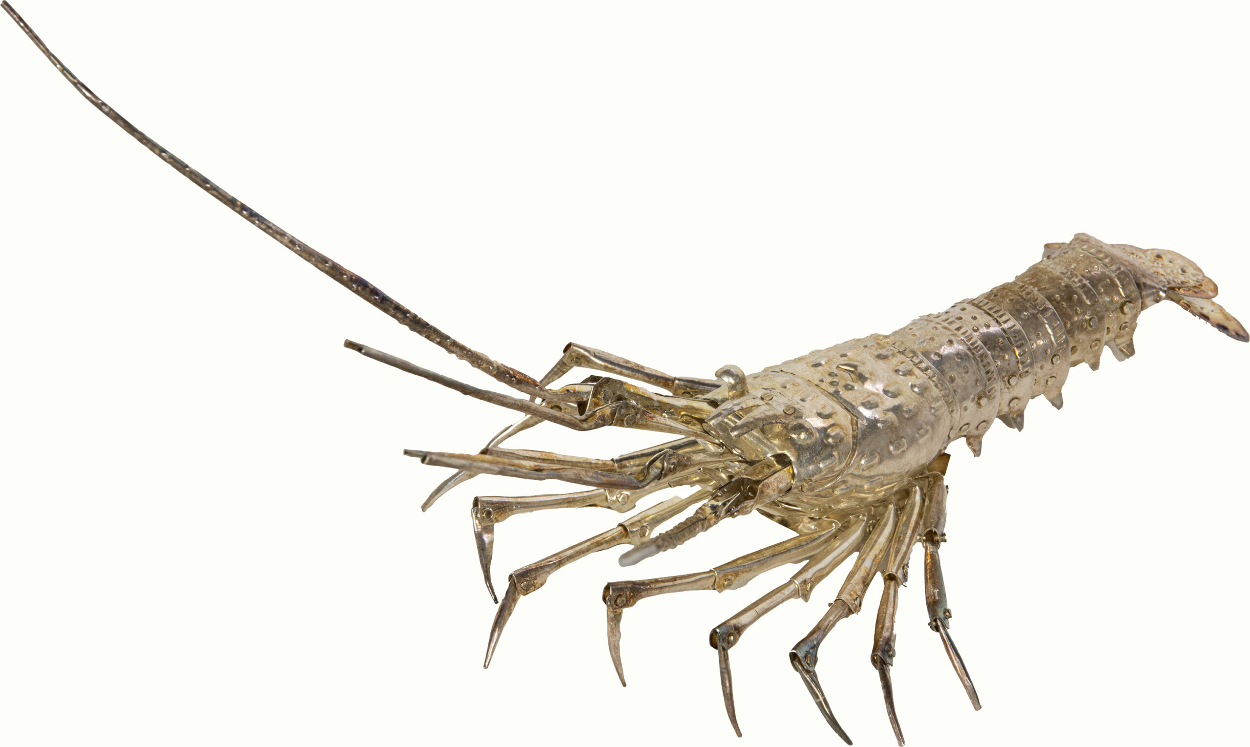A Japanese silver okimono of an articulated spiny lobster. <br><b>Estimate: $800–$1,200</b>