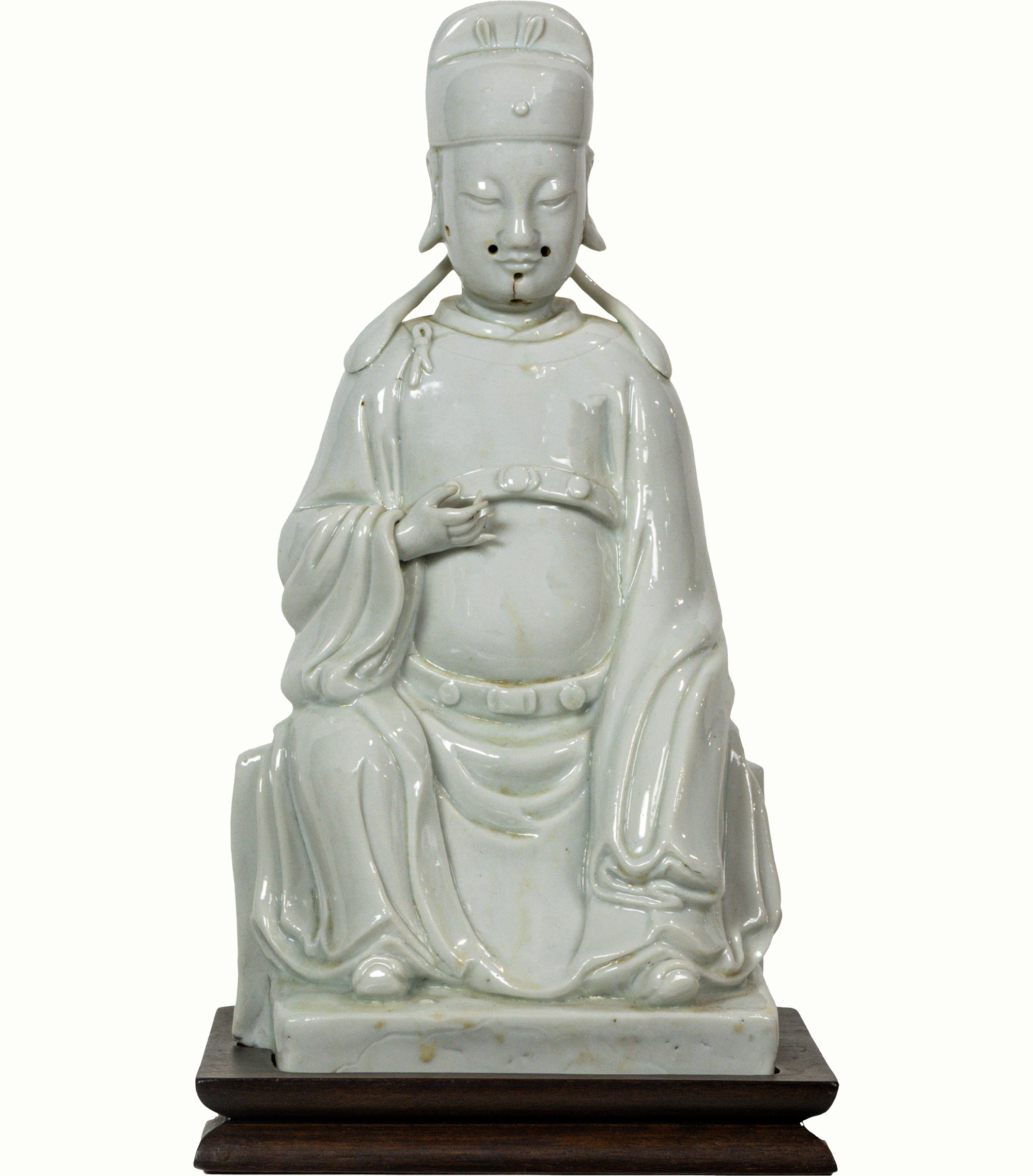 A Chinese Dehua seated figure of Wenchang, late Ming dynasty. Estimate: $800–$1,200