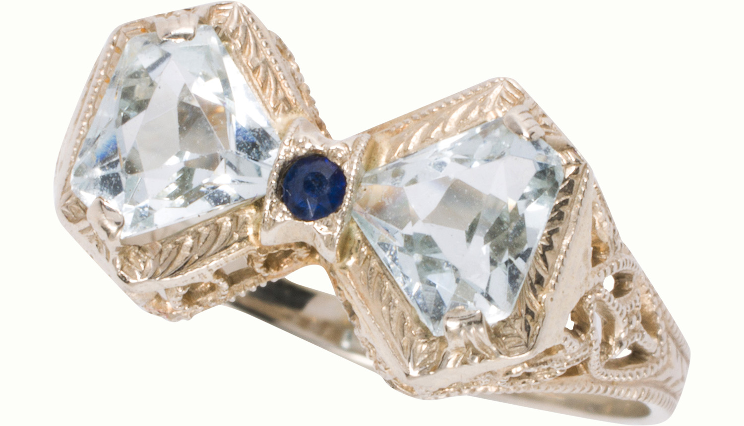 An Art-Deco aquamarine, sapphire, and platinum bowtie ring. Estimate: $100–$200