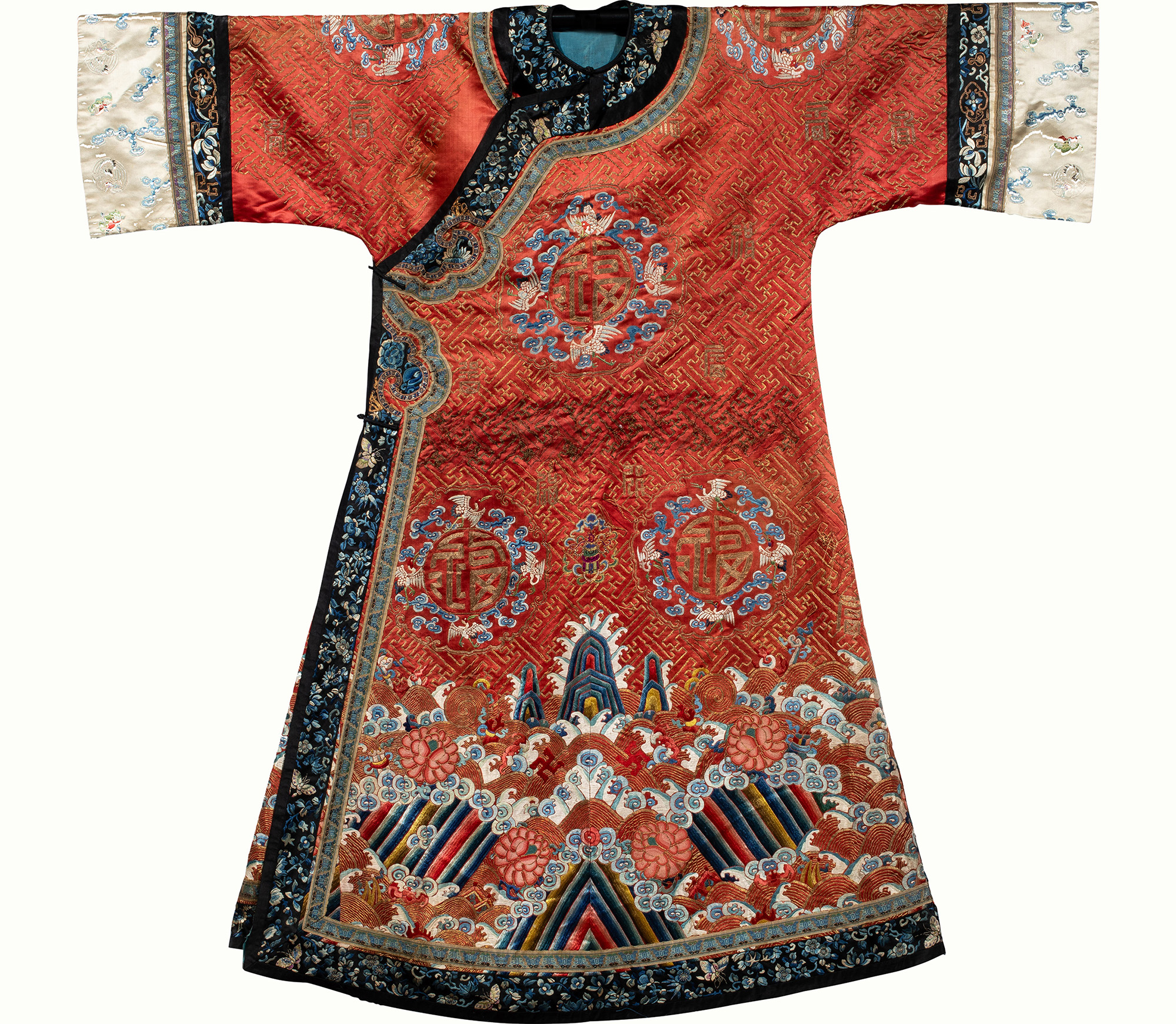 A Chinese embroidered red-ground lady’s robe with longevity symbols. <br><b>Sold: $7,560</b>