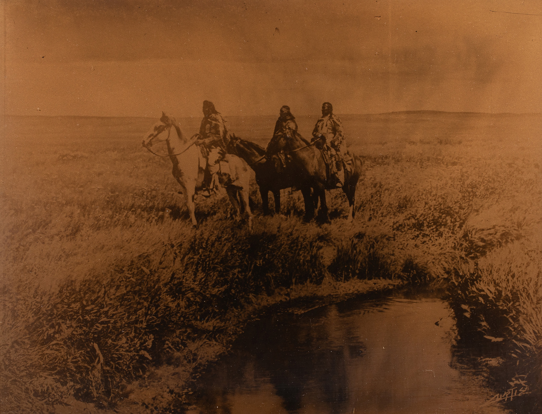 Edward Sherriff Curtis (American, 1868–1952), The Three Chiefs, Piegan, orotone, 11″ x 14″. Estimate: $5,000–$7,000