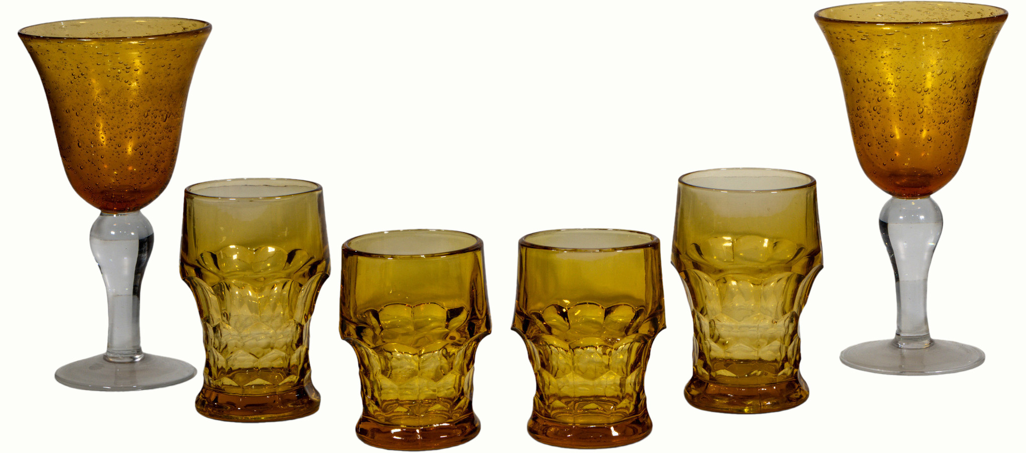 A group of vintage amber and topaz glass. Estimate: $50–$100
