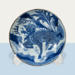A Chinese blue and white &lsquo;qilin&rsquo; charger, Transitional period. Estimate: $3,000–$5,000