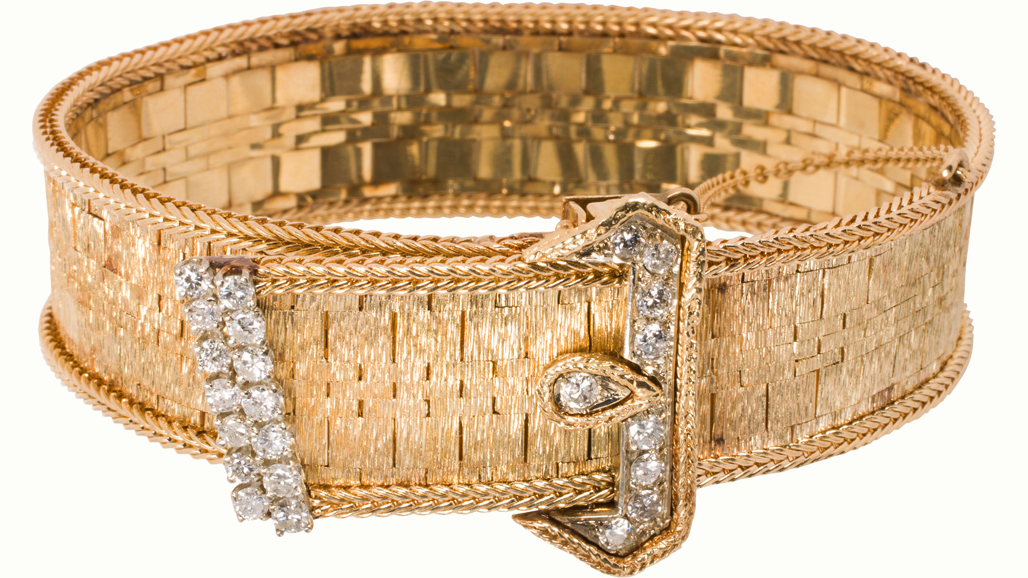 A Retro diamond and 18k gold bracelet. Estimate: $8,000–$12,000