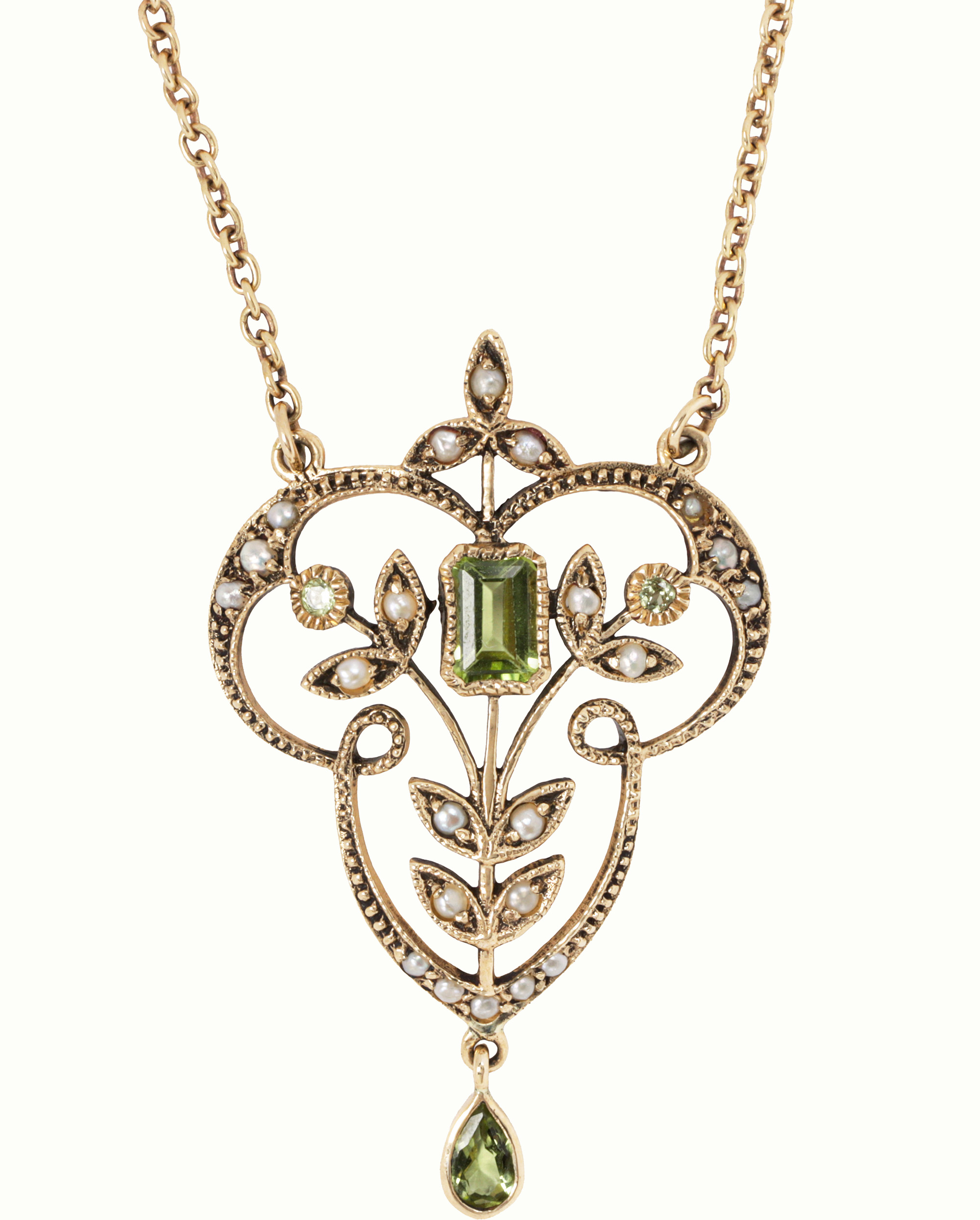 An antique peridot, seed pearl and 9k gold lavalier necklace. Estimate: $500–$700