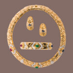 A diamond, gem-set and 18k gold suite. Estimate: $25,000–$35,000