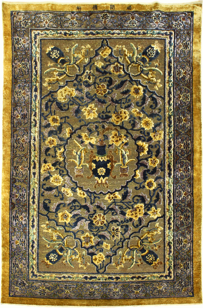 An antique Chinese silk and gilt metal thread carpet. Sold: $28,750