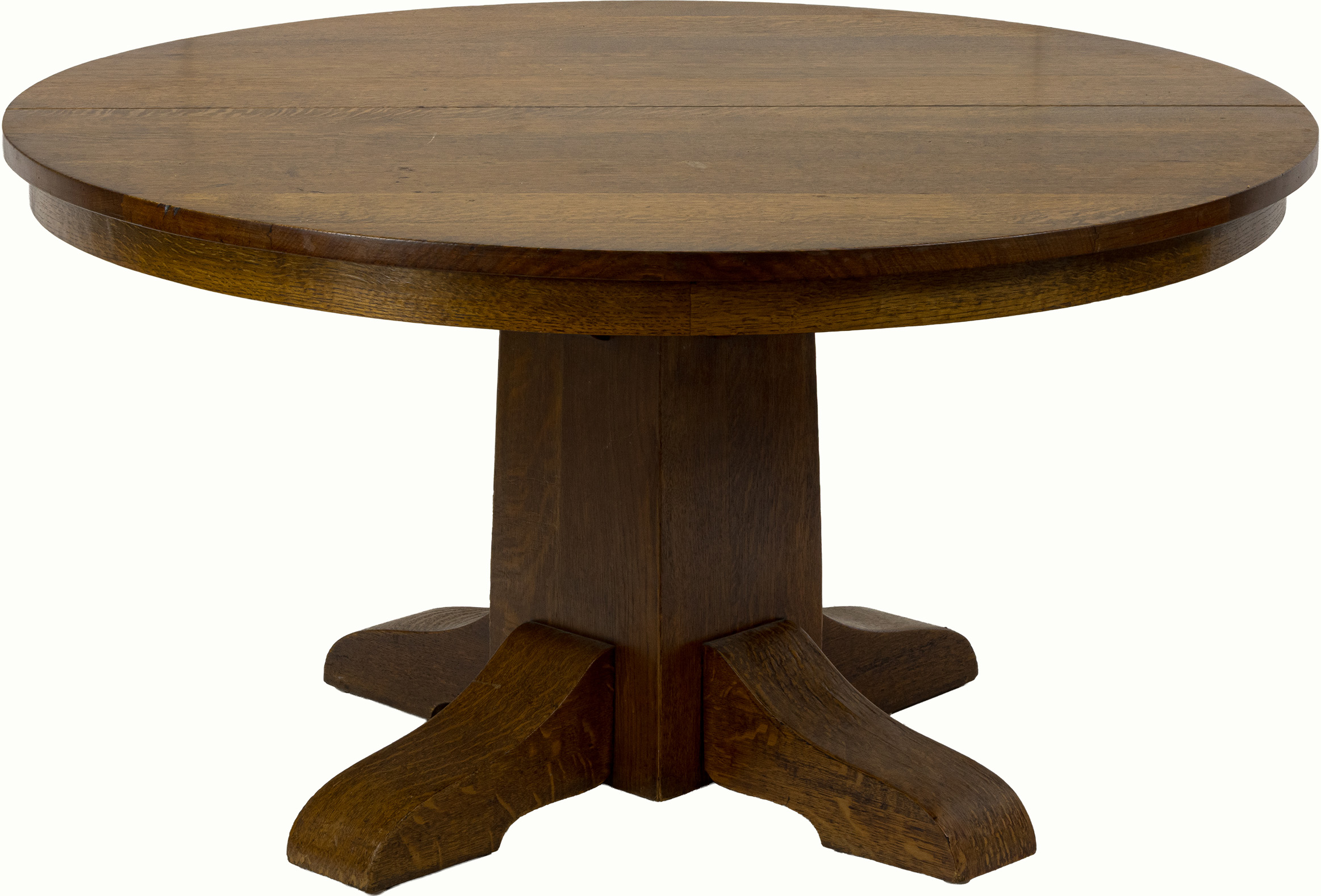 A Gustav Stickley dining table, model 65, with three leaves. Estimate: $1,500–$2,500