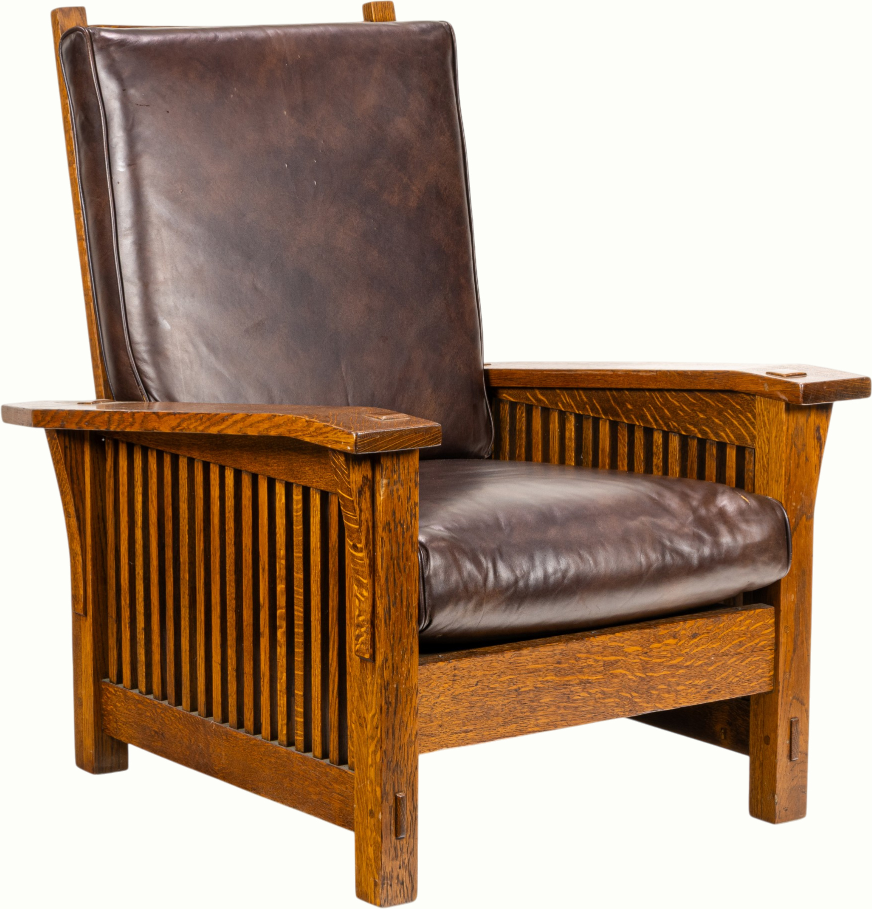 A Gustav Stickley model 369 spindle Morris chair. Estimate: $2,500–$3,500