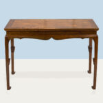 A Chinese huanghuali side table, banzhuo. Estimate: $10,000–$15,000
