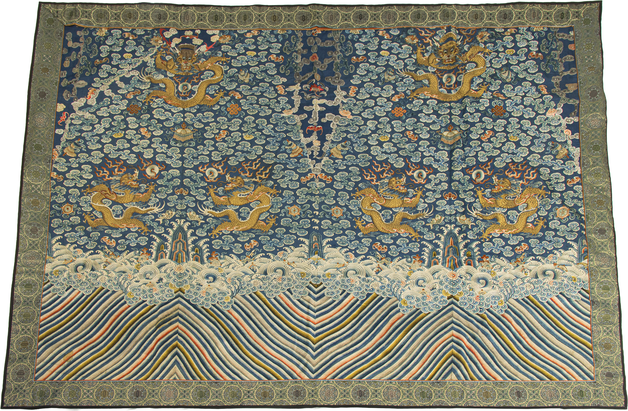 A Chinese embroidered ‘dragon’ robe fragment panel, 19th century, 58″ x 73″. Provenance: The Estate of Michael Tilson Thomas Estimate: $600–$900