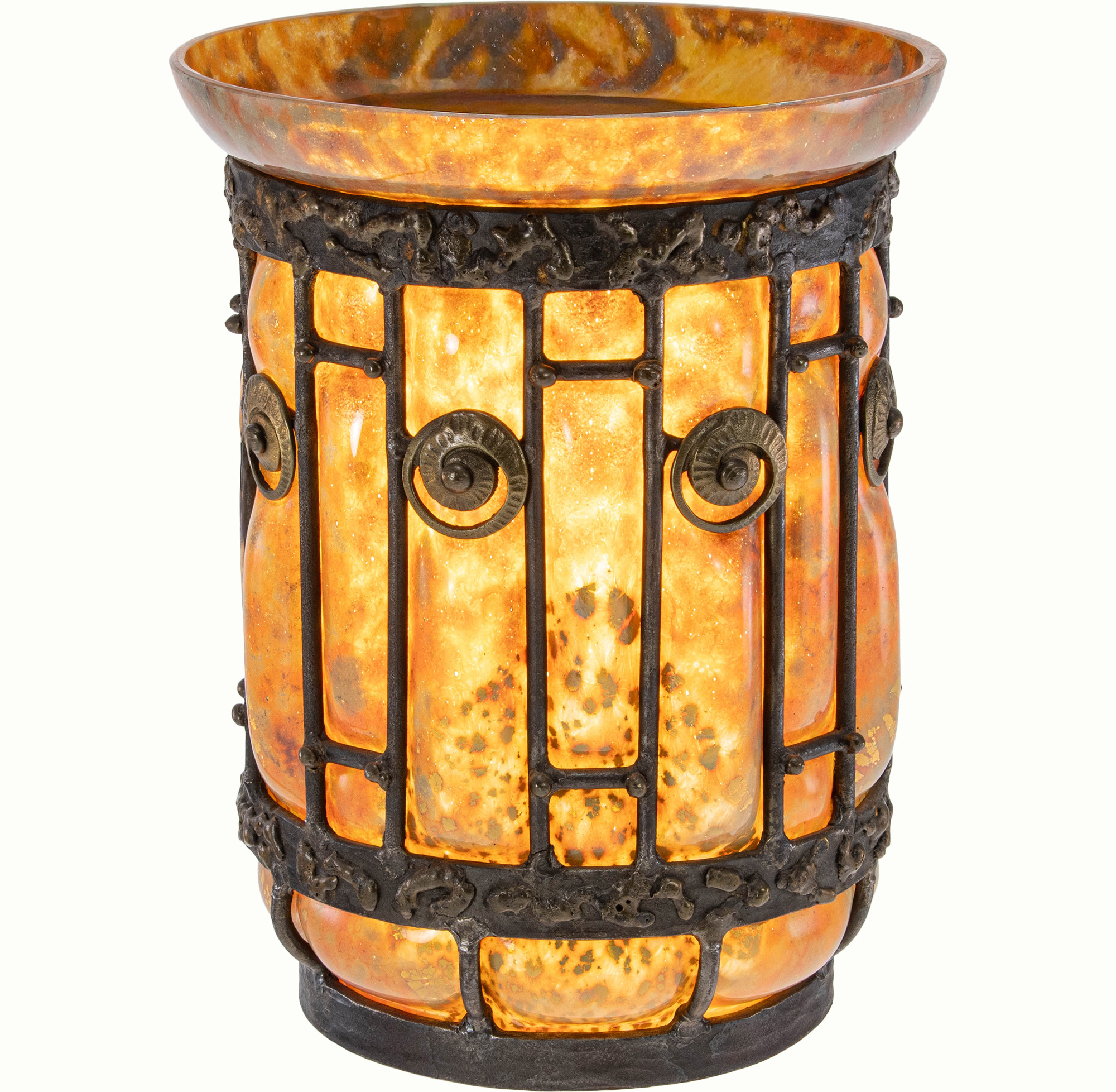 A Louis Majorelle and Daum Nancy iron and iridescent glass vase. Estimate: $800–$1,200